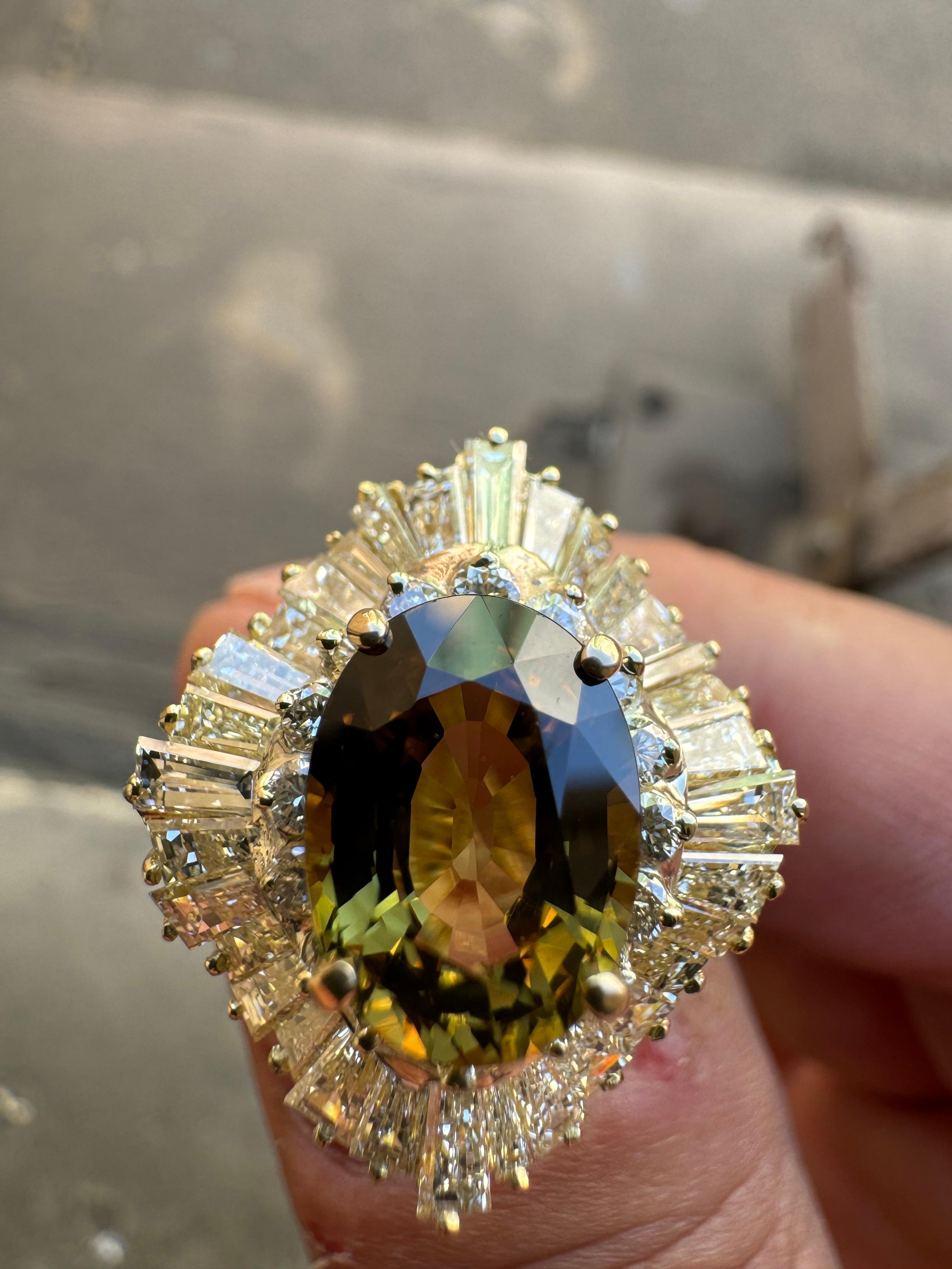 Dekara Designs Collection

Metal- 90% Platinum, 10% Iridium. 18K Yellow Gold, .750.

Stones- GIA Certified Oval Alexandrite 4.21 Carats, 32 Tapered Baguette Diamonds I-K Color VS1-VS2 Clarity, 16 Round Diamonds I-J Color VS2-SI1 Clarity 4.96 Total