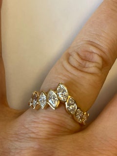 18 Karat Gold Band Ring Set All Around with Bezel Set Marquise Shape Diamonds