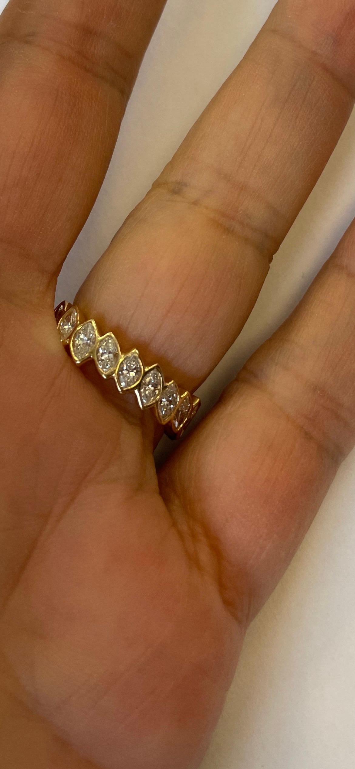 Marquise Cut 18 Karat Gold Band Ring Set All Around with Bezel Set Marquise Shape Diamonds For Sale