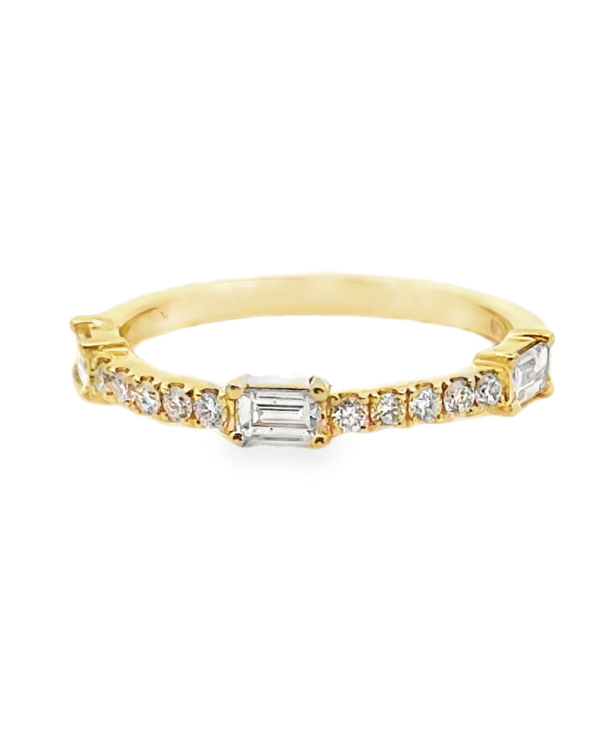 18K yellow gold diamond ring with 10 round diamonds weighing 0.14 carat total and 3 baguette diamonds weighing 0.29 carat total.  

Finger size is 6.5 and can be resized up or down by up to 2 sizes.