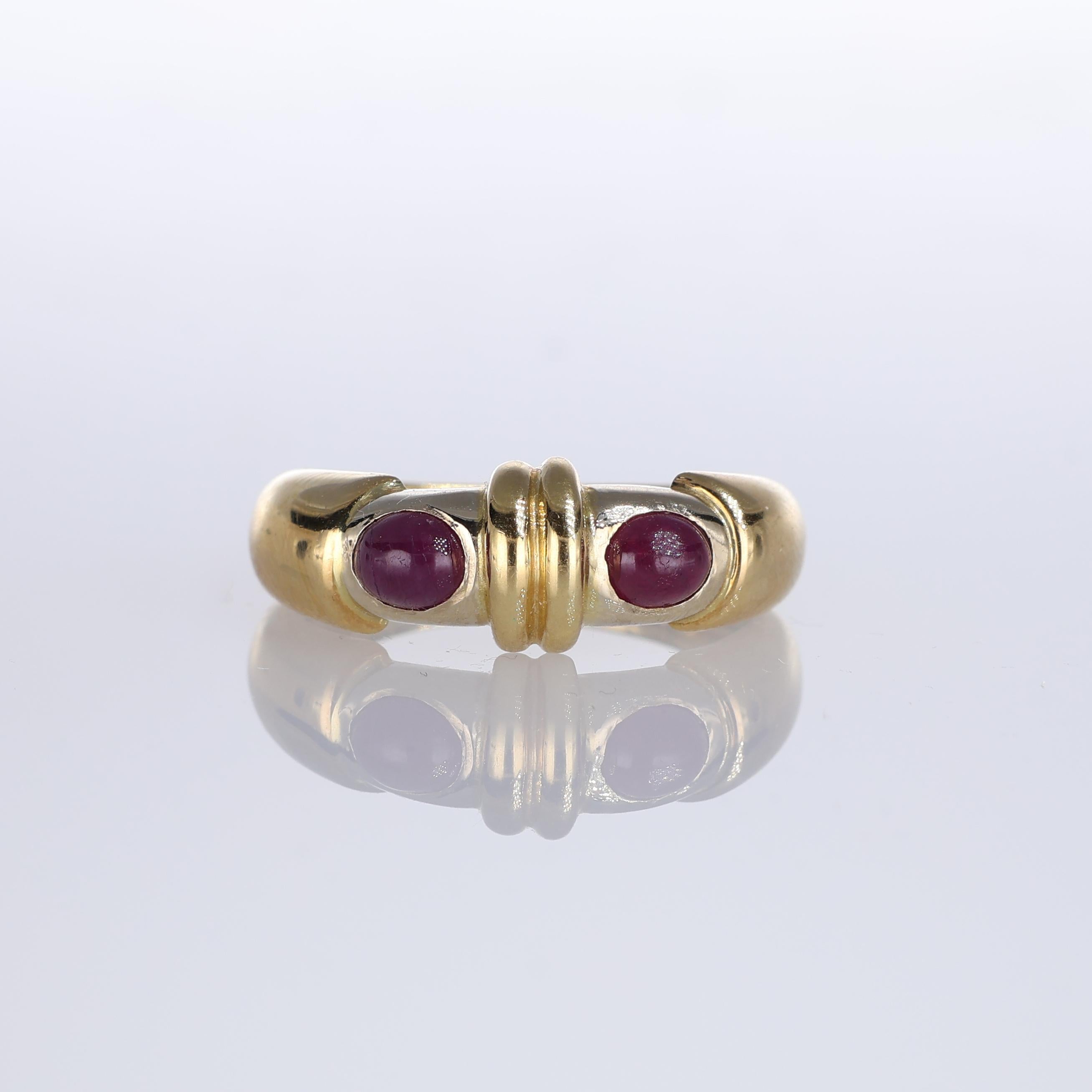 IMPORTANT NOTE:
✔ No additional costs will be added to this order.
✔ Shipping and customs duties are fully covered by us.
--------------------
This elegant 18K yellow gold band ring features two striking cabochon rubies, totaling 0.89 carats. The