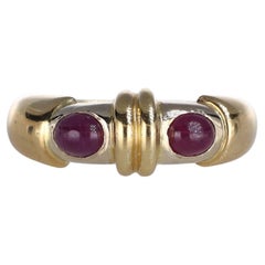 Anillo de oro amarillo de 18 quilates con rubíes cabujón