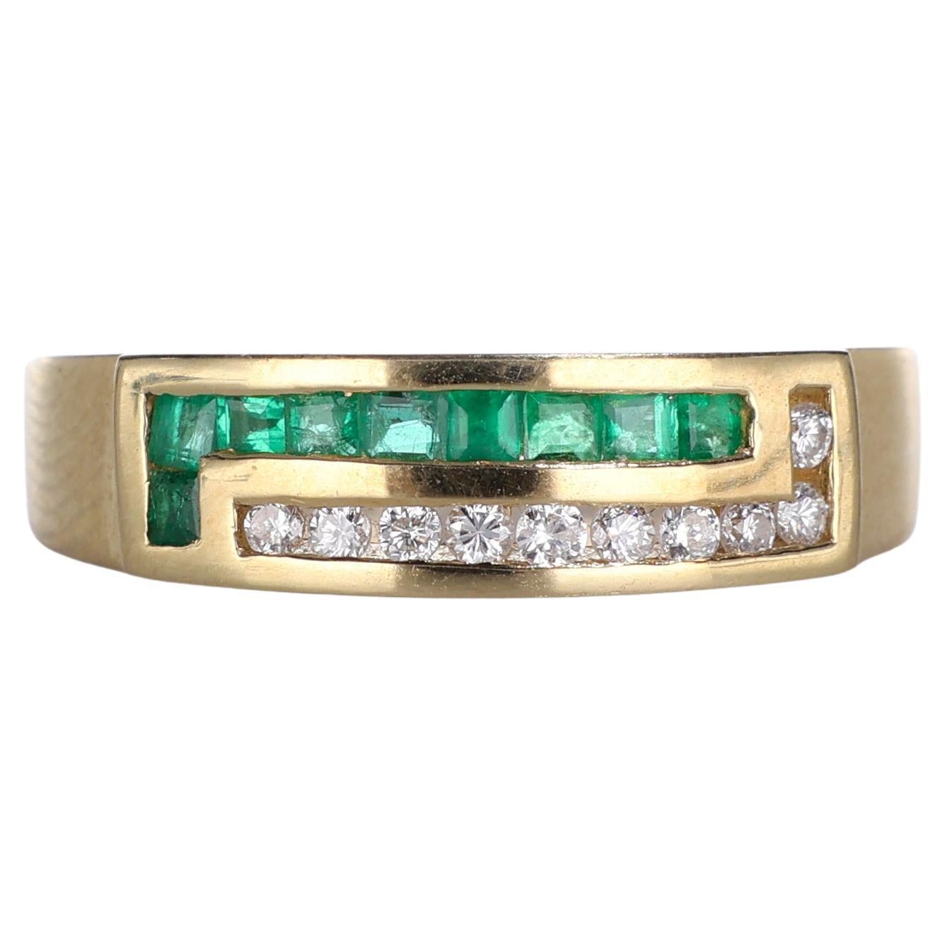 18 Karat Gelbgold Bandring mit Diamanten und Smaragden im Baguetteschliff