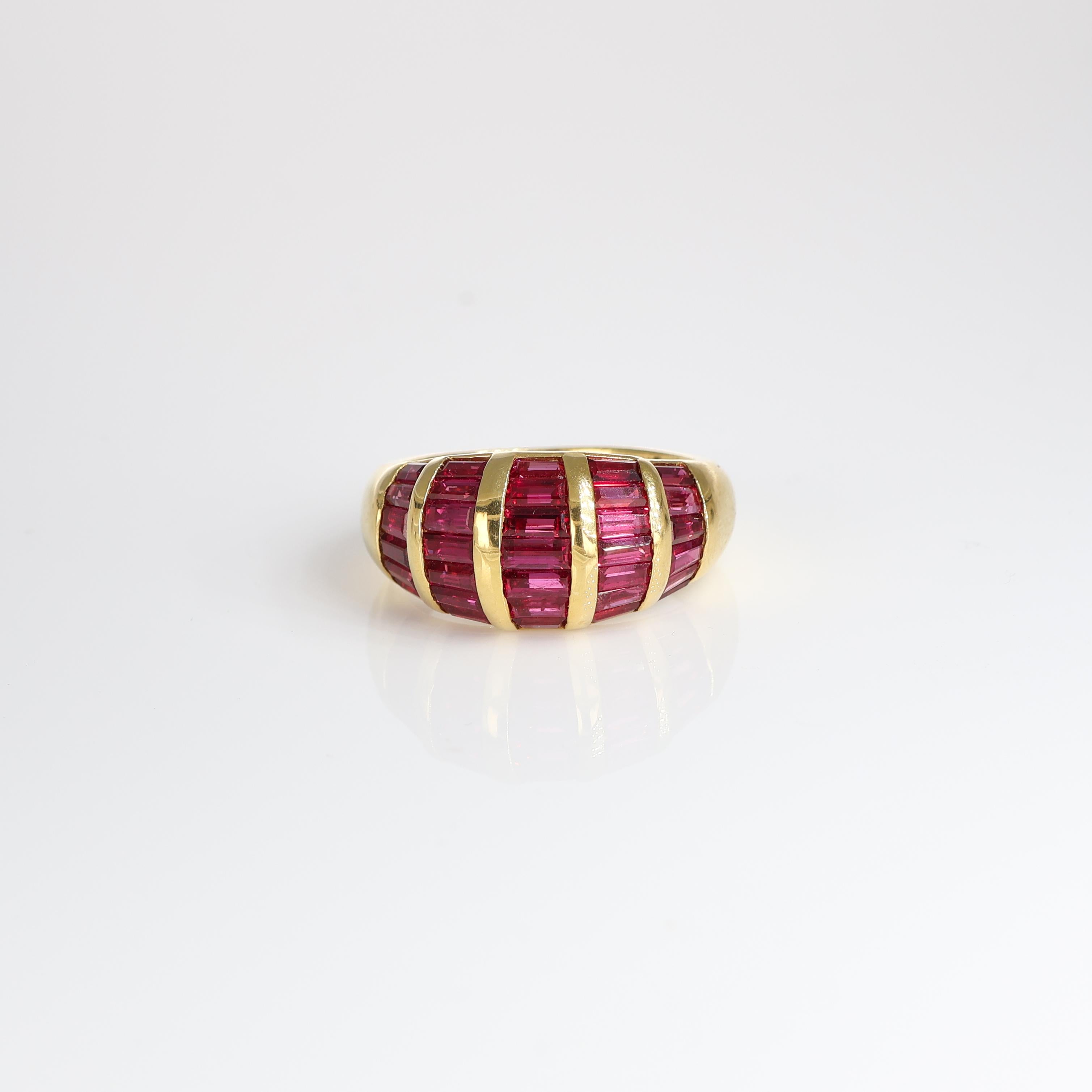 IMPORTANT NOTE:
✔ No additional costs will be added to this order.
✔ Shipping and customs duties are fully covered by us.
--------------------
This exquisite 18k yellow gold band ring features an elegant design with rows of vibrant carré-cut rubies