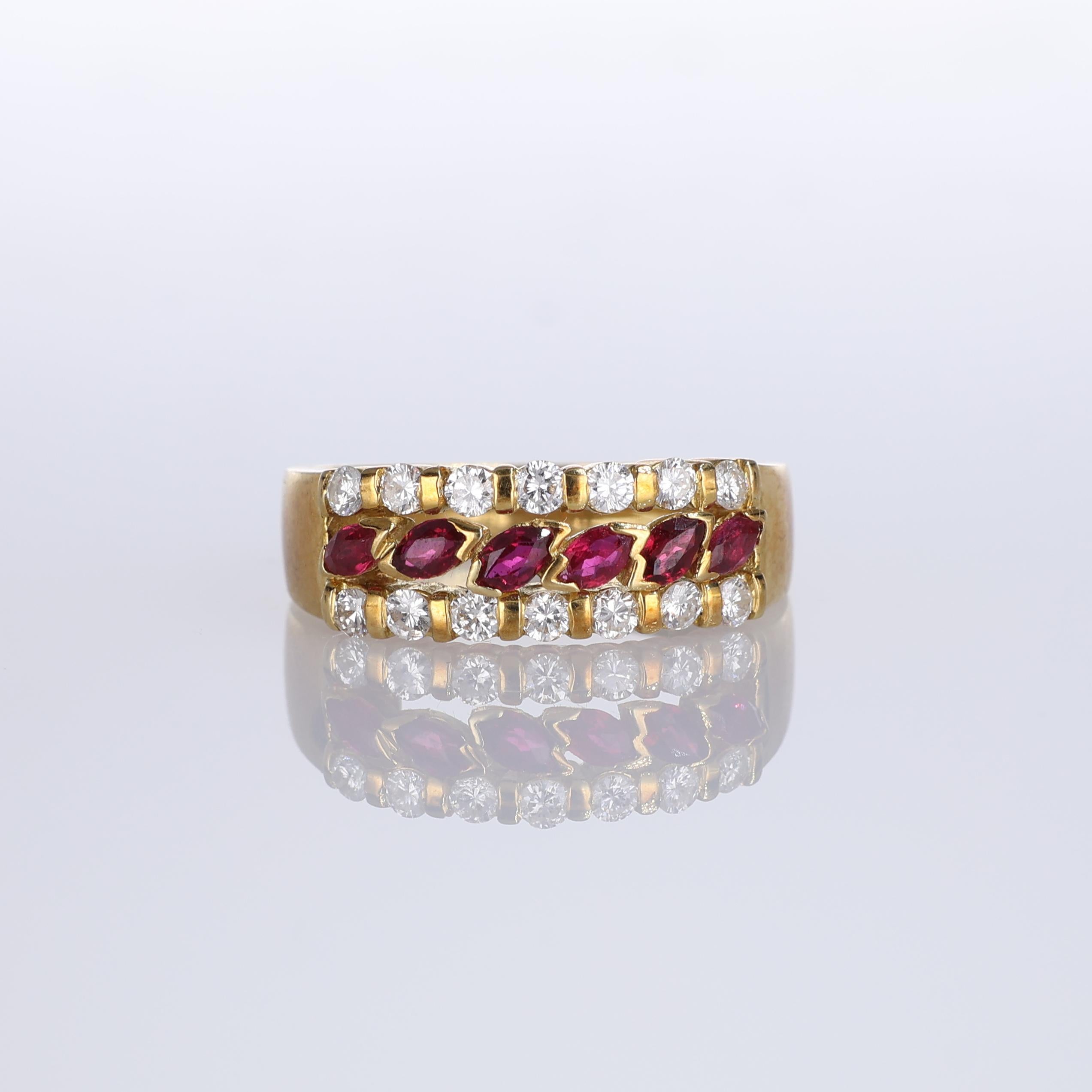 IMPORTANT NOTE:
✔ No additional costs will be added to this order.
✔ Shipping and customs duties are fully covered by us.
--------------------
A refined 18K yellow gold band ring featuring a central row of navette-shaped rubies totaling 0.50 carats.