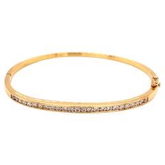 Bracciale Bangle in oro giallo 18 carati con diamanti incastonati