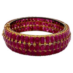 18K Yellow Gold Bangle Bracelet with 75 Carat Oval Rubies Gemstones Size 7