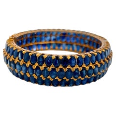 18K Yellow Gold Bangle Bracelet with 75 Carat Oval Sapphire Gemstones