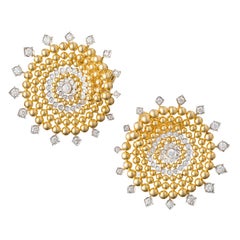 Orecchini a spirale con diamanti in oro giallo 18k