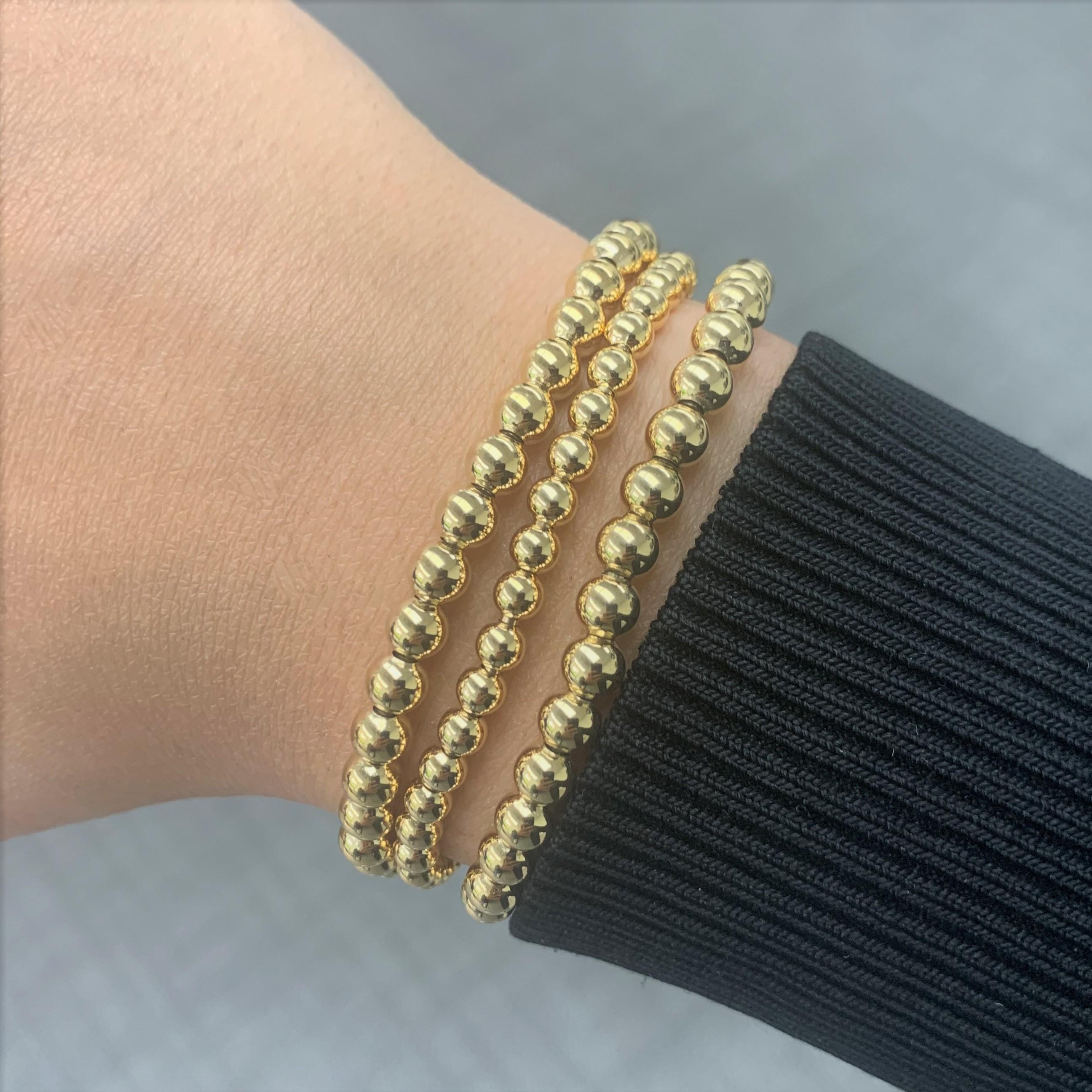 Bracelet extensible en perles d'or jaune 18 carats Pour femmes en vente