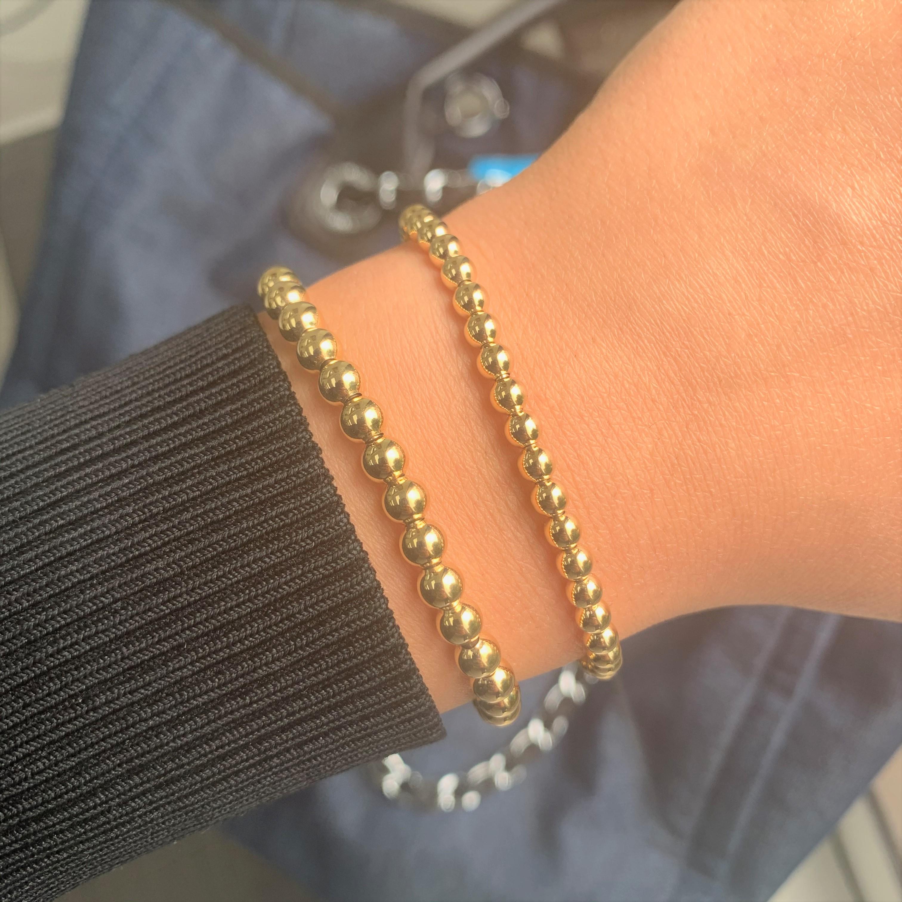 Bracelet extensible en perles d'or jaune 18 carats en vente 1