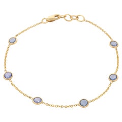 Pulsera de cadena apilable de oro amarillo de 18 quilates con bisel de zafiro azul de 2,2 quilates