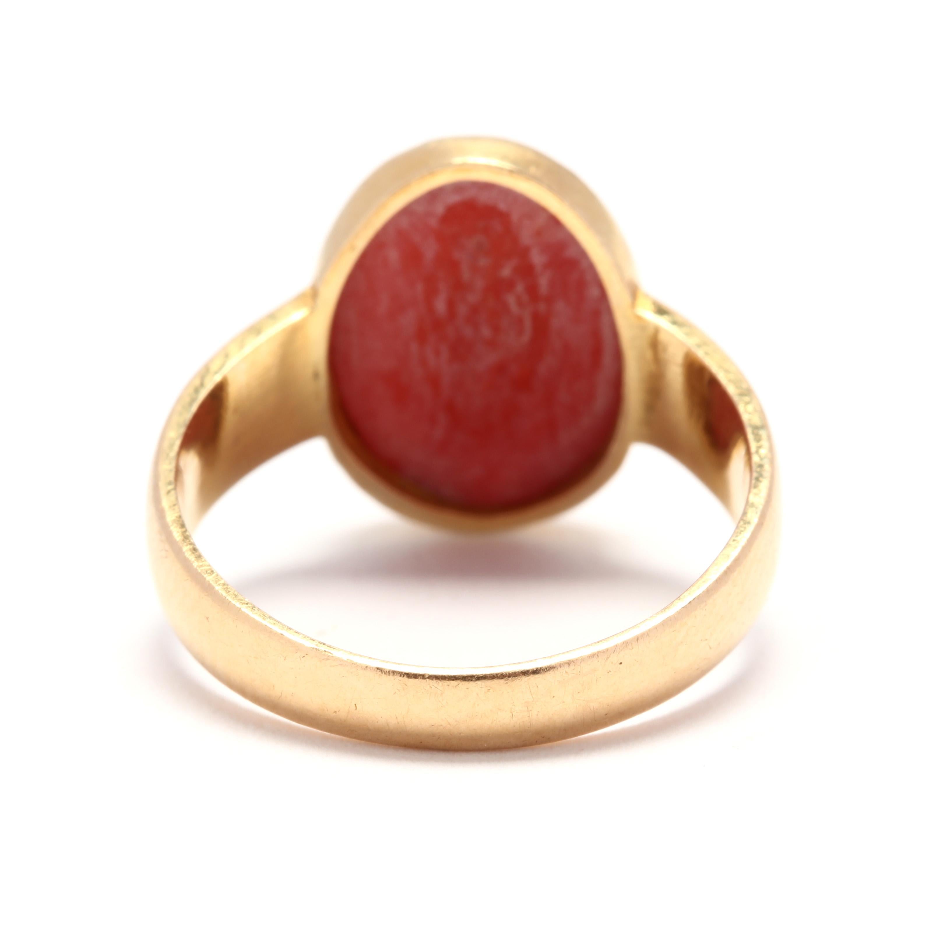 Oval Cut 18 Karat Yellow Gold and Bezel Set Coral Solitaire Ring