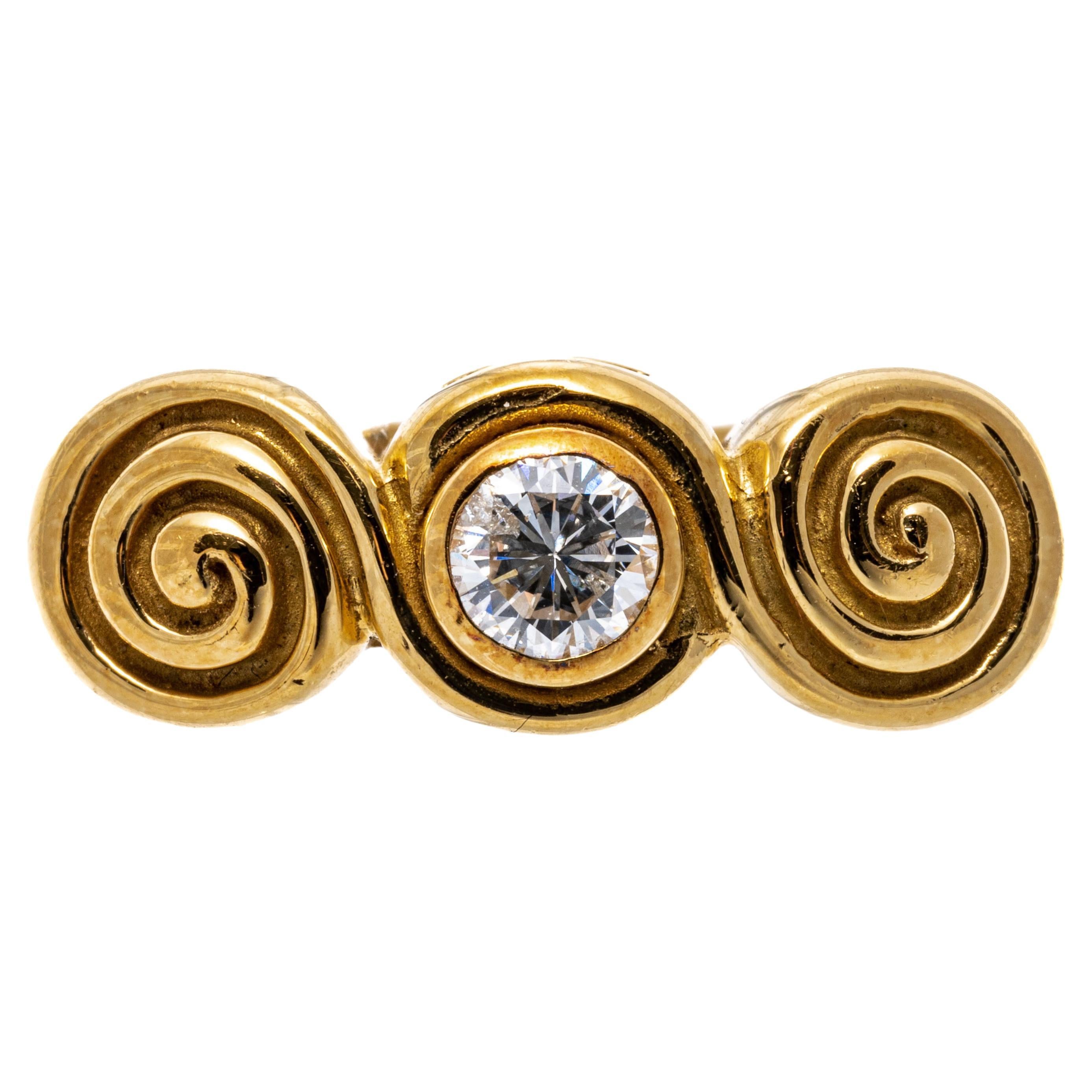 Bague tourbillon en or jaune 18 carats sertie d'un diamant rond brillant et d'un chaton en volutes