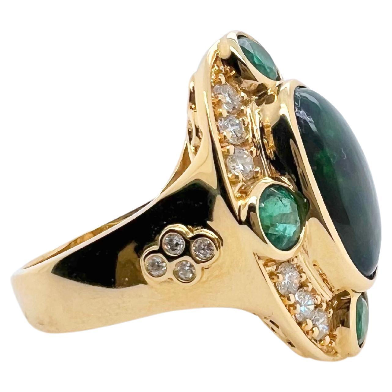 Contemporary 18k Yellow Gold Black Ethiopian Opal with Diamonds and Emeralds Ring For Sale