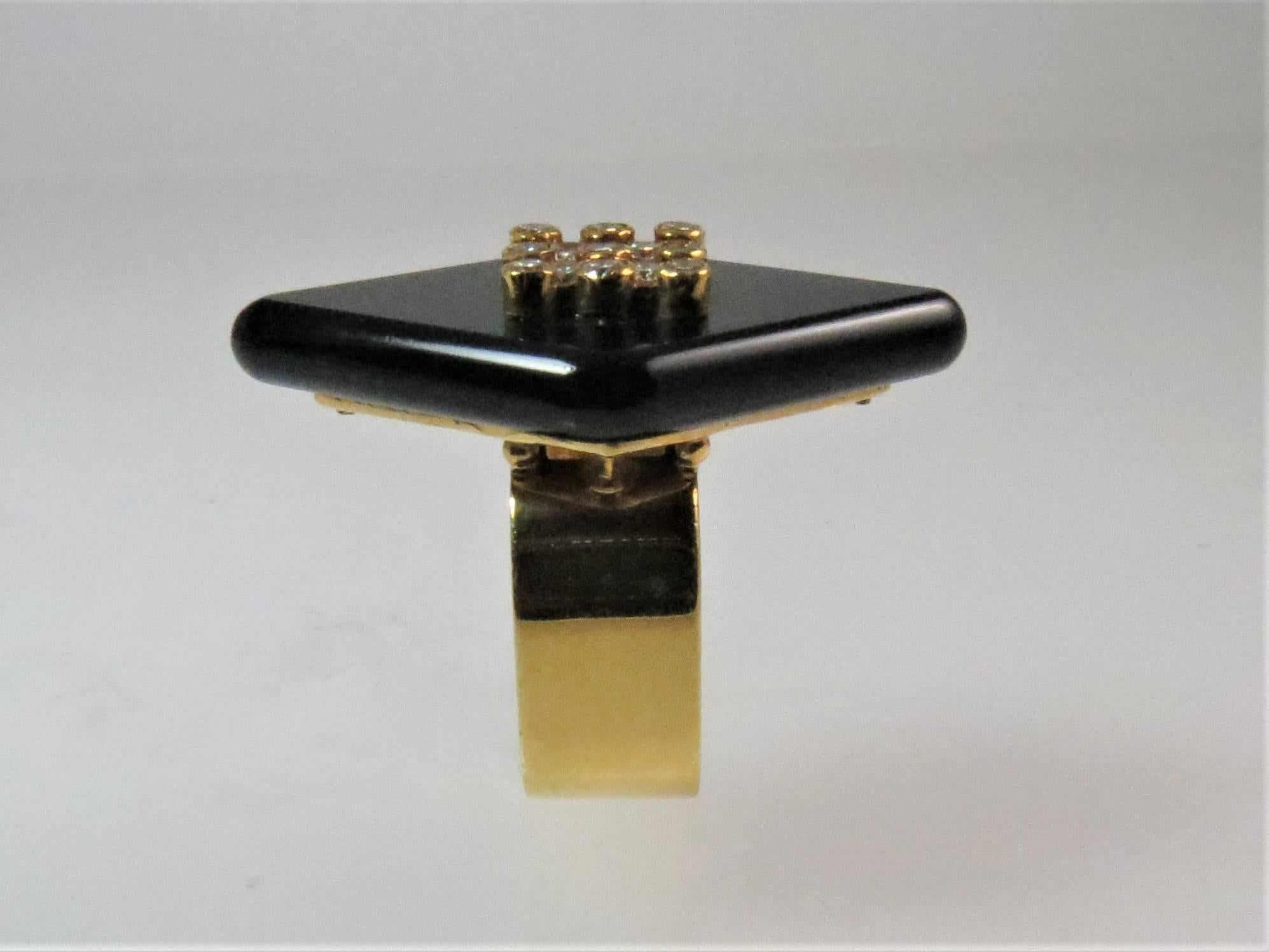 Contemporary 18 Karat Yellow Gold Black Onyx and Diamond Ring