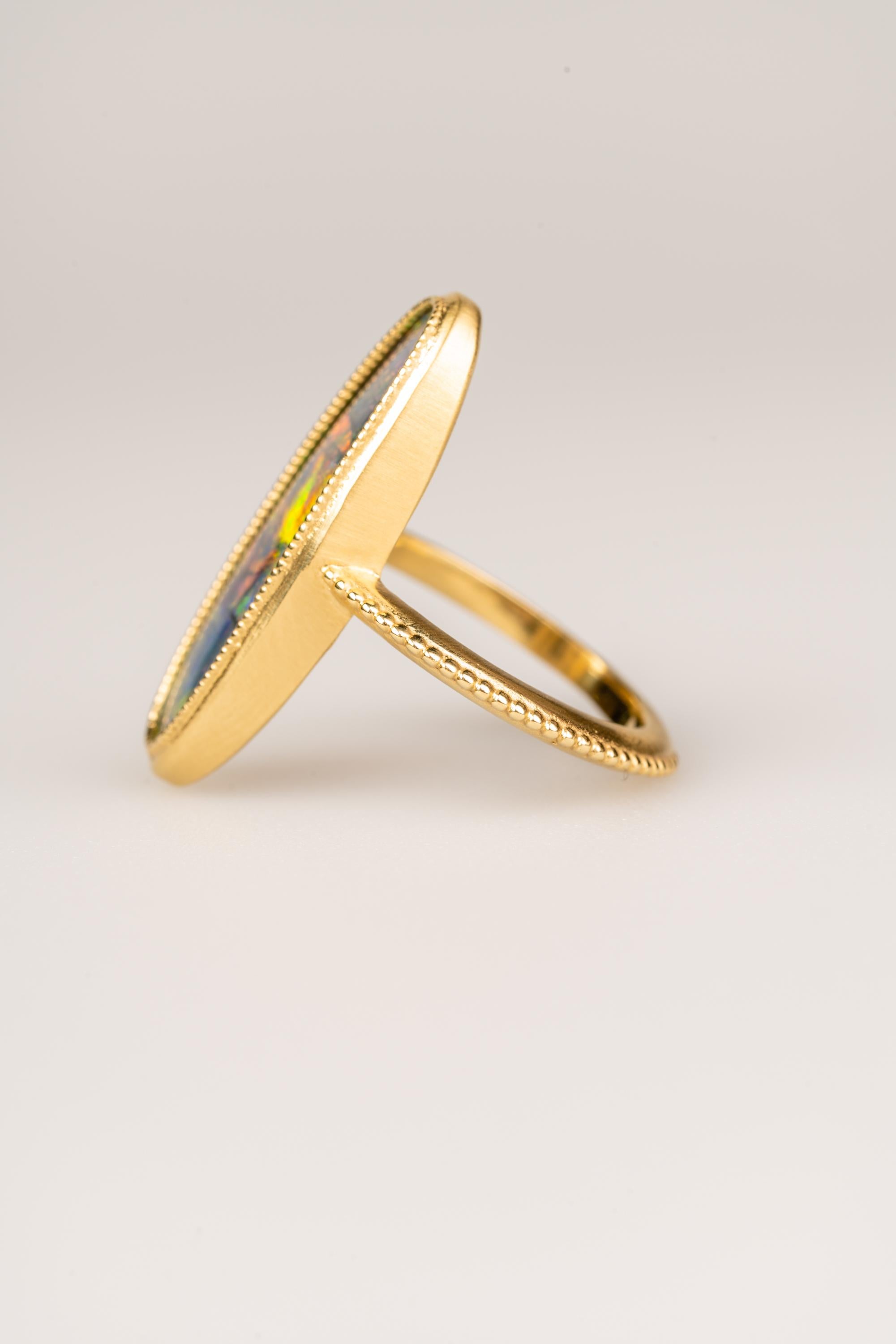 Contemporary 18 Karat Yellow Gold Black Opal Ring