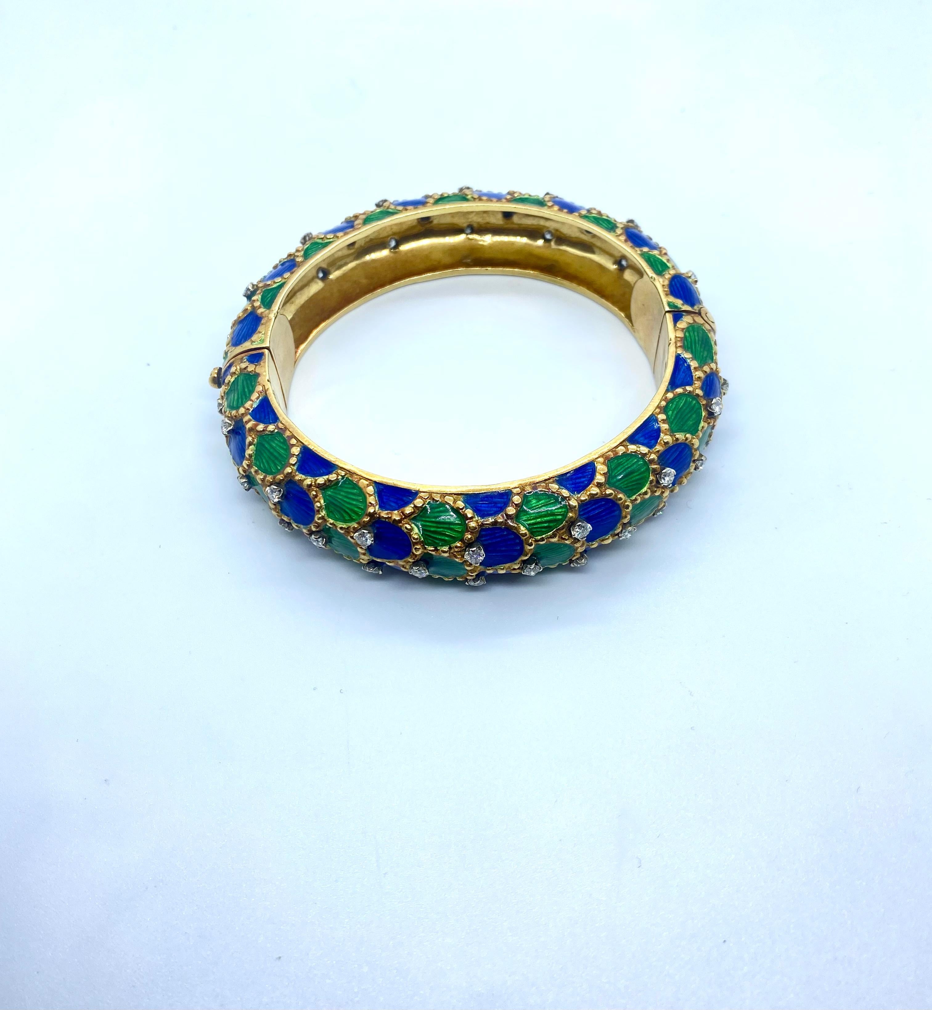 18K Yellow Gold Blue and Green Enamel Fishnet Bangle Bracelet . The inside diameter is 2 1/8 inches high and 2 3/8 inches wide. The bangle weighs 103 grams diamond 0,50ct
