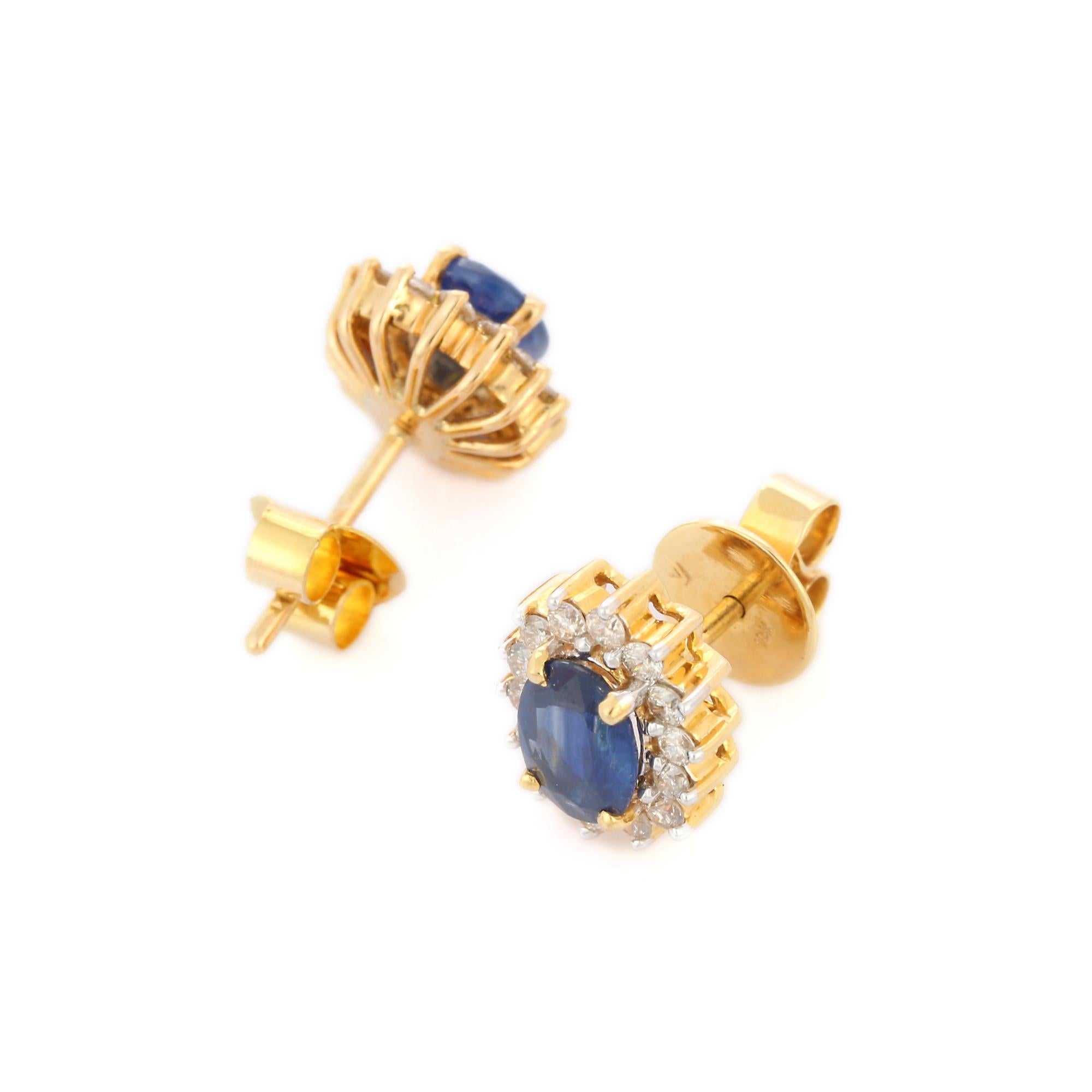 Art déco Clous d'oreilles en or jaune 18 carats avec saphir bleu et diamants  en vente