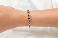 Pulsera de diamantes y zafiros azules de oro amarillo de 18 quilates