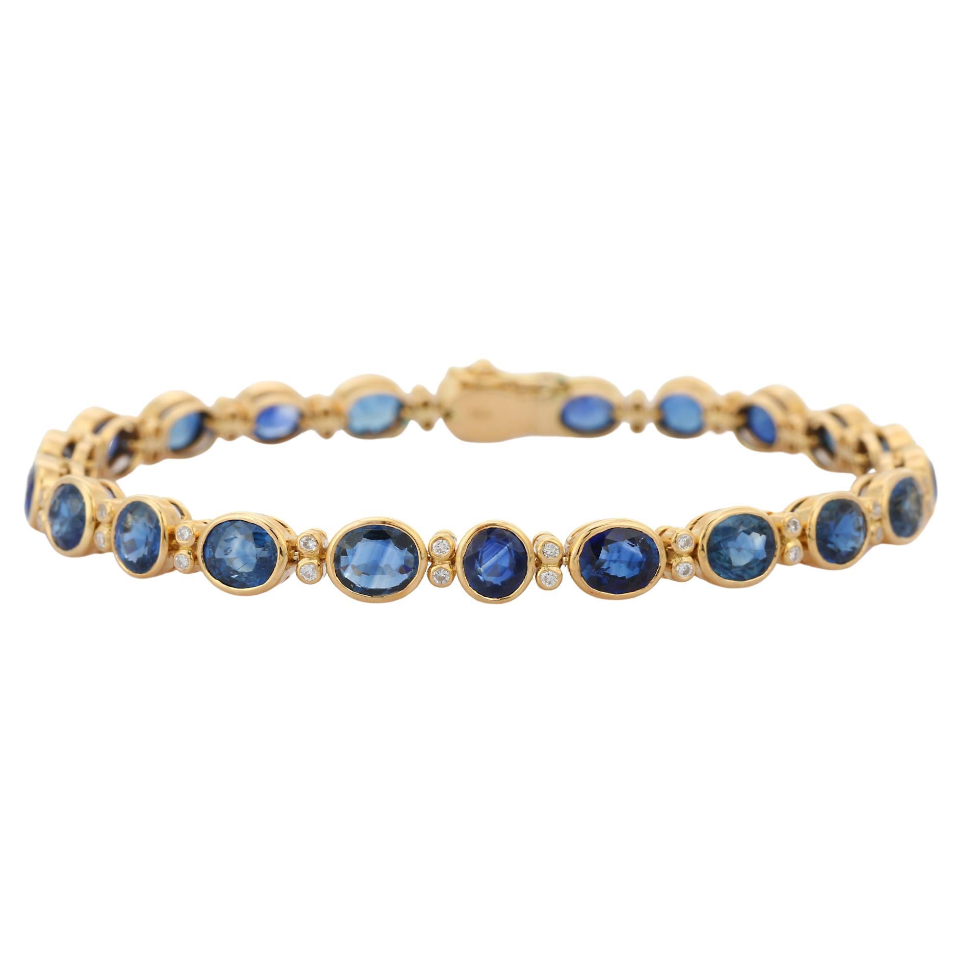 Armband aus 18 Karat Gelbgold mit blauem Saphir und Diamant