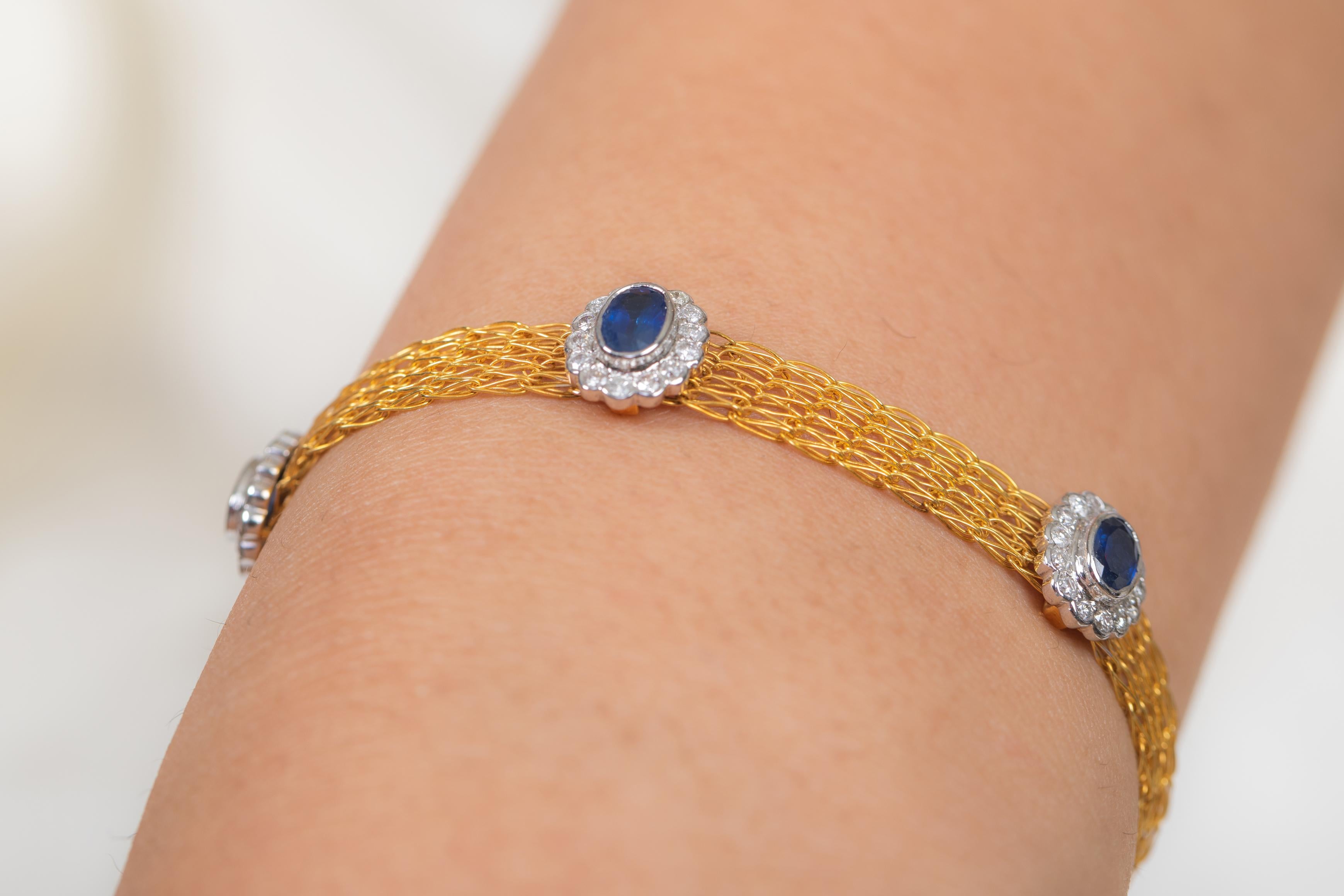 The wearing of charms may have begun as a form of amulet or talisman to ward off evil spirits or bad luck.
This blue sapphire bracelet has a oval cut gemstone and diamonds in 18K Gold. A perfect piece of jewelry to adorn your jewelry