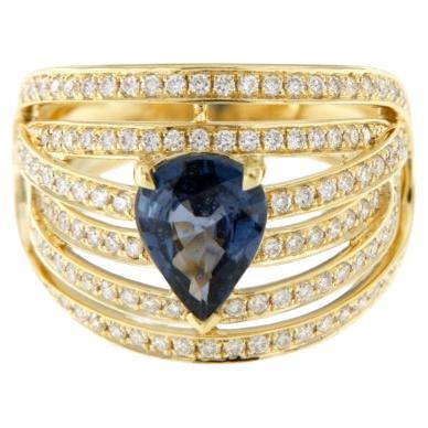 Anello con zaffiro blu e diamante in oro giallo 18 carati in vendita