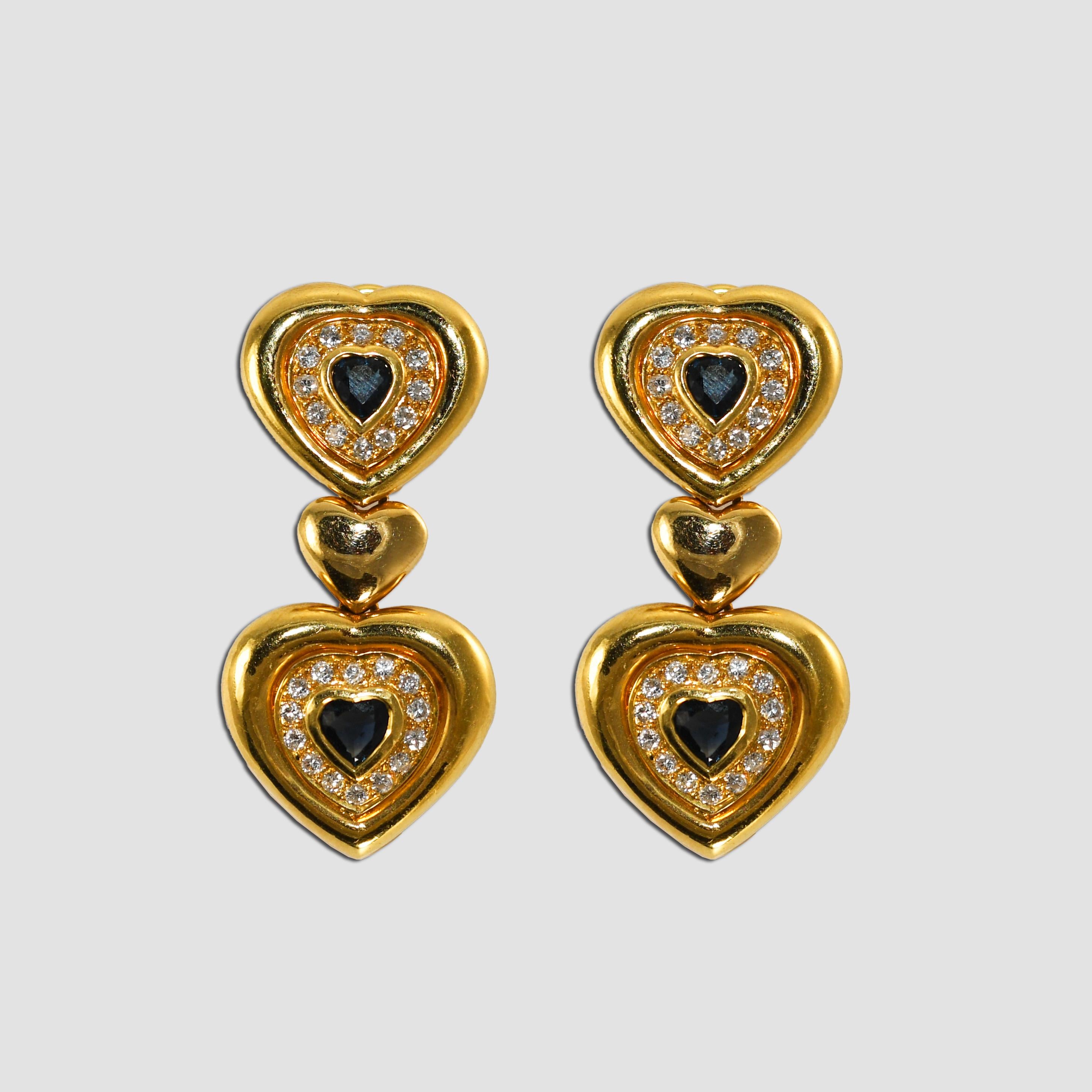 18k yellow gold Ladies Necklace and Earrings set.
Tests 18KY gold using an electronic tester. The diamond and blue sapphire Necklace weighs 74.4 grams gross weight. 
There are 2.75 carats of small round diamonds, G, H, I color, Vs clarity
There are