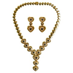 Schmuck-Set aus 18 Karat Gelbgold mit blauem Saphir und Diamant