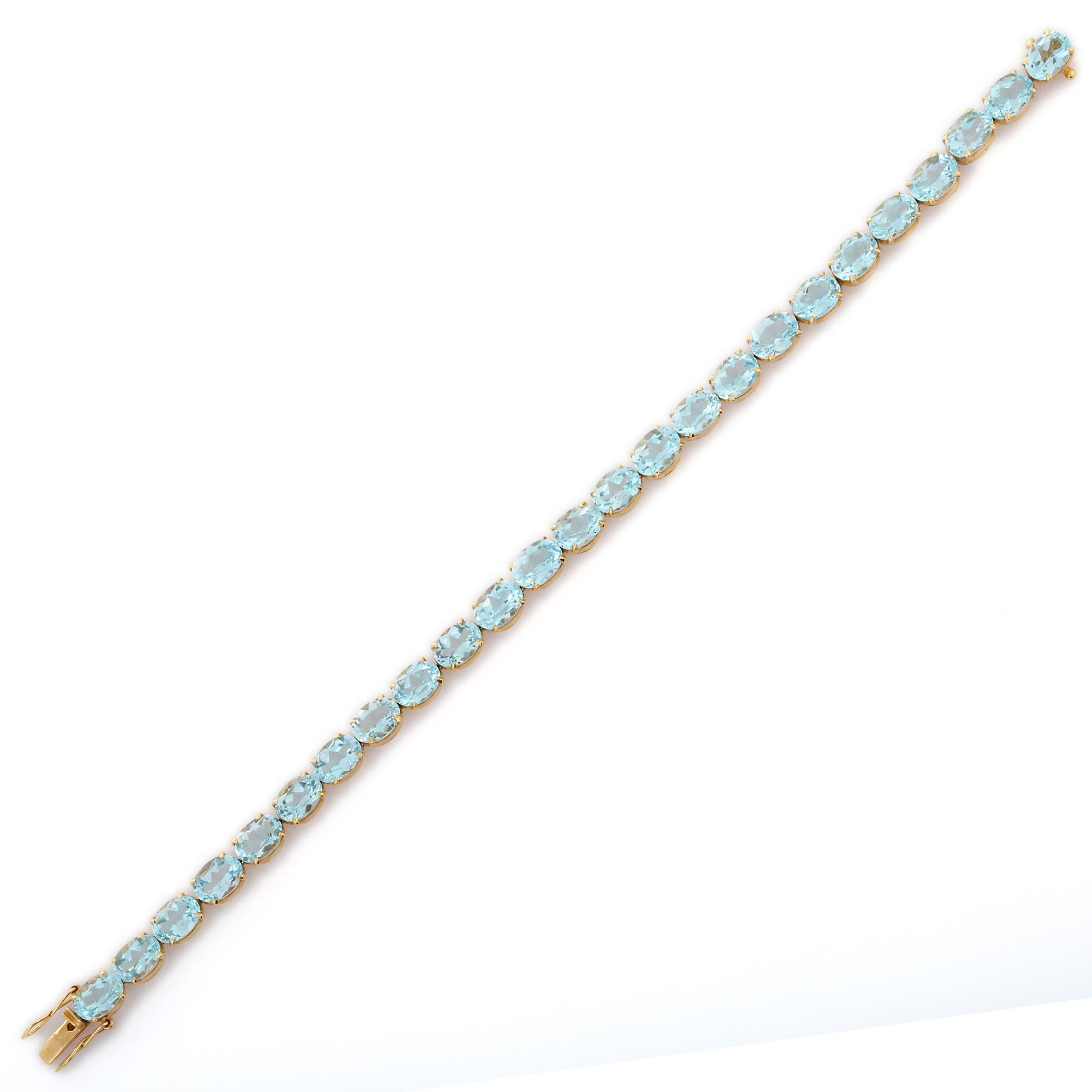 Oval Cut 18kt Solid Yellow Gold 28.5 Carats Faceted Blue Topaz Gemstone Tennis Bracelet For Sale