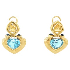 Orecchini a forma di cuore pendente in oro giallo 18k con topazio blu, citrino e zaffiro