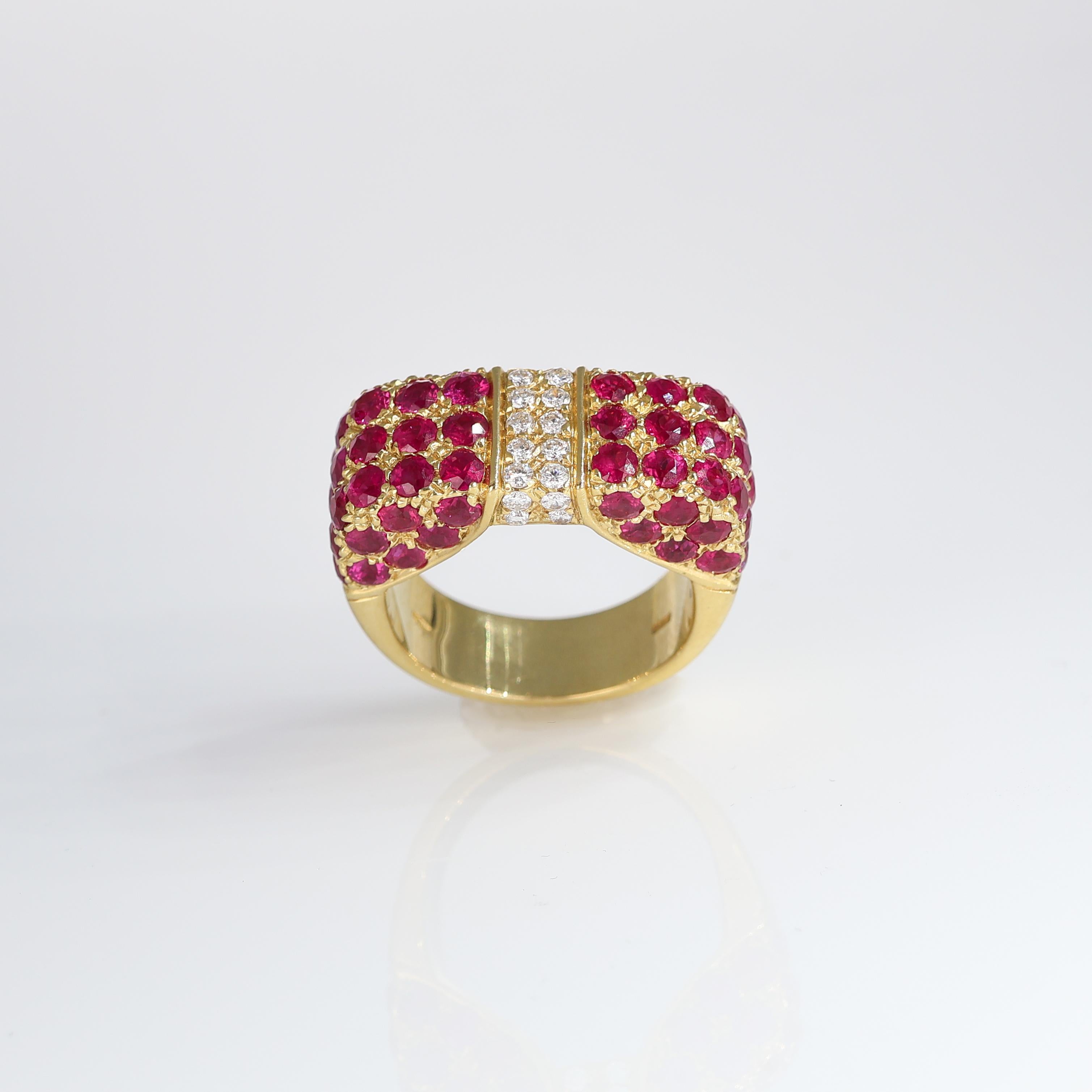 IMPORTANT NOTE:
✔ No additional costs will be added to this order.
✔ Shipping and customs duties are fully covered by us.
--------------------
An enchanting 18k yellow gold bow-shaped ring adorned with an intricate pavé of rubies and brilliant-cut