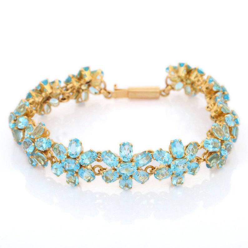 18 Karat Solid Yellow Gold 38.1 ct Blue Topaz Floral Bracelet 1