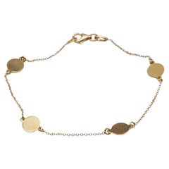Pulsera de oro amarillo de 18 quilates con motivos ovalados