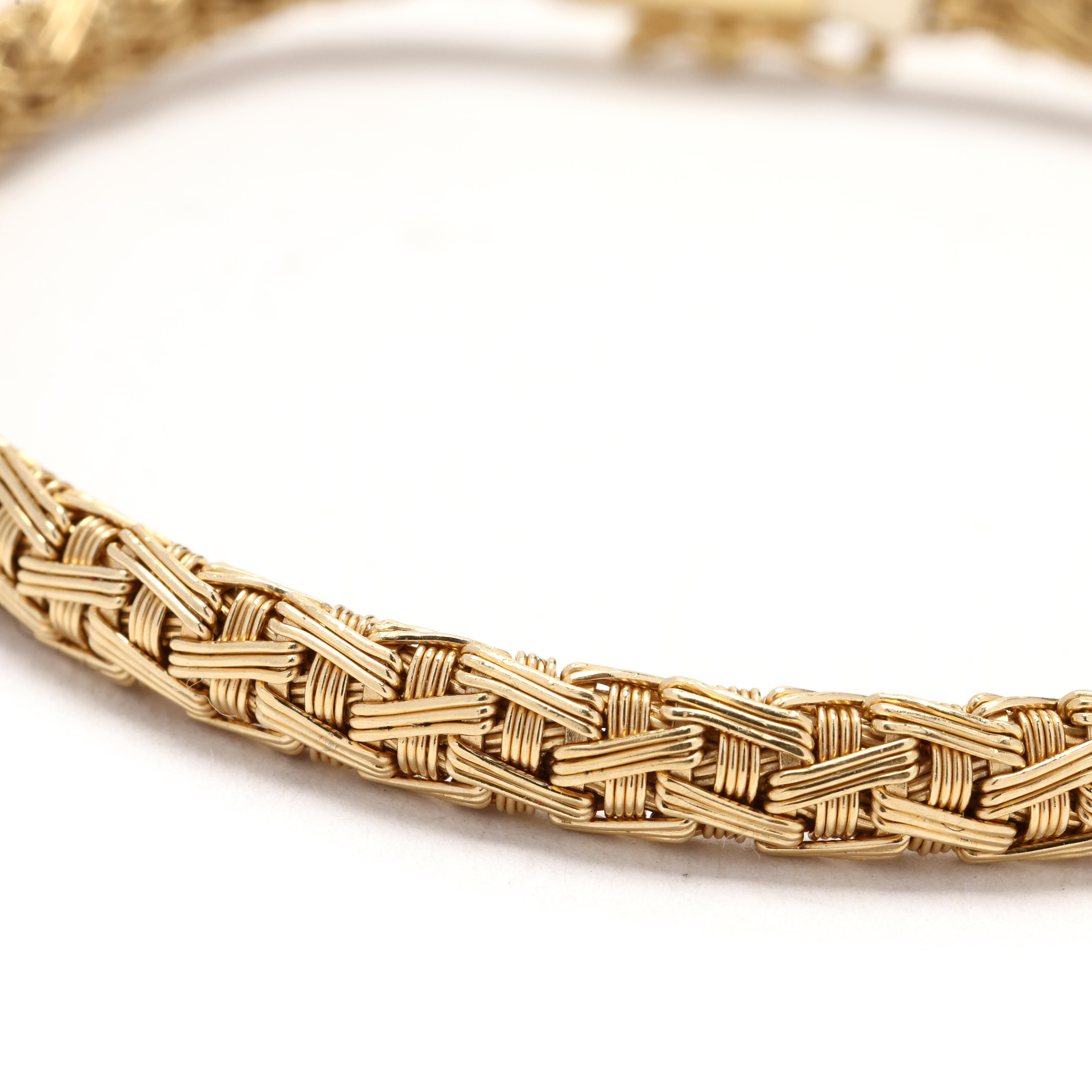 This 18k yellow gold braided bracelet is a stunning piece of jewelry that is perfect for stackable bracelets or can be worn on its own for a chic and sophisticated look. Crafted in 18k yellow gold, this bracelet features a braided design that adds a
