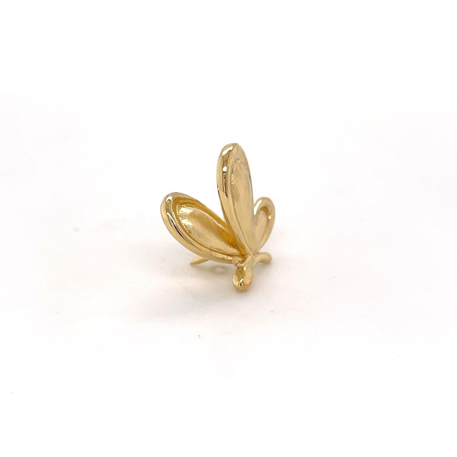 An 18k Yellow Gold butterfly lapel pin. This pin was made and designed by llyn strong.