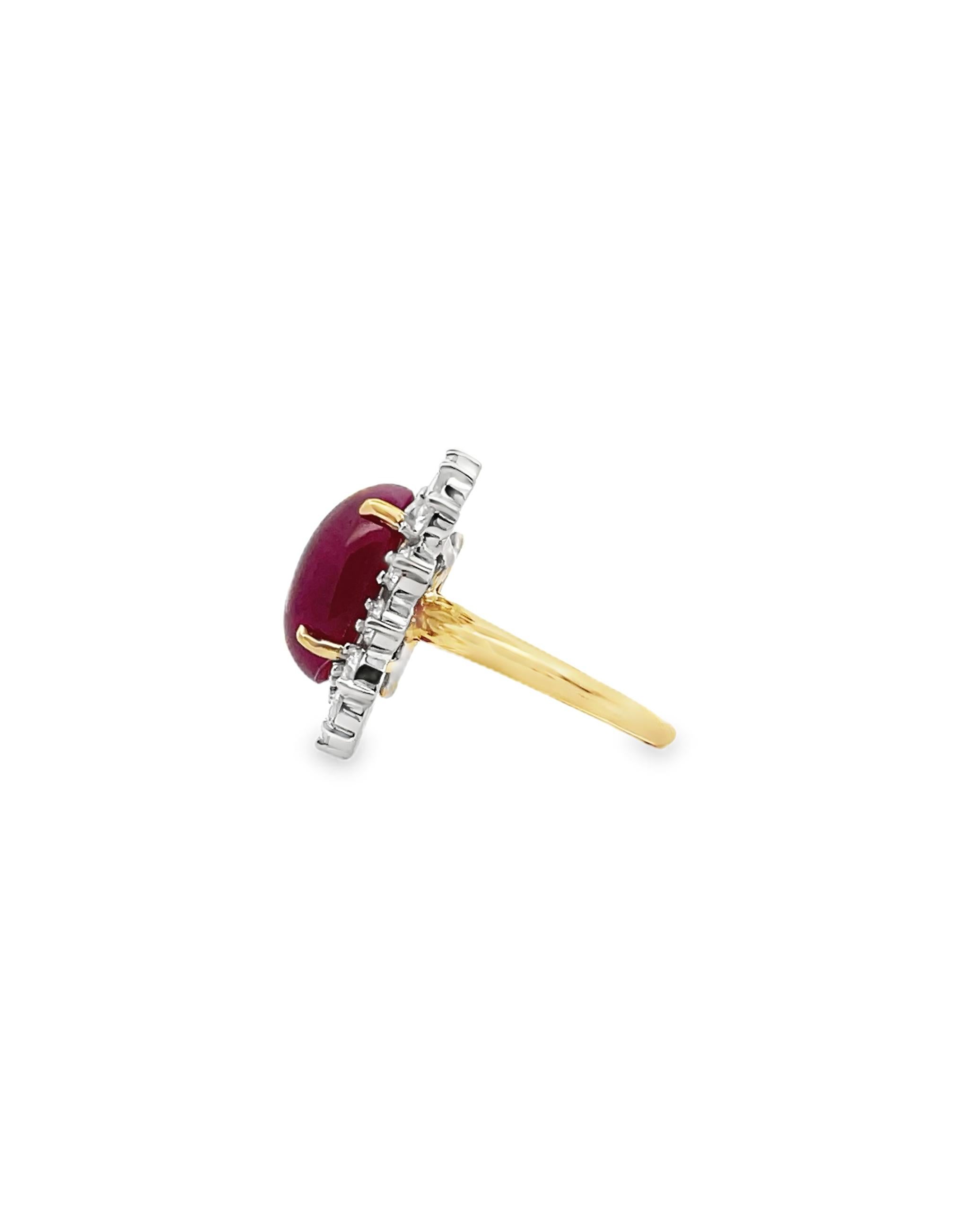 18K yellow gold diamond and ruby fashion ring furnished with 14 round brilliant-cut diamonds weighing approximately 1.40 carats total and one center cabochon ruby measuring 11x14mm.

* Finger size 6, can be sized up or down by up to two sizes