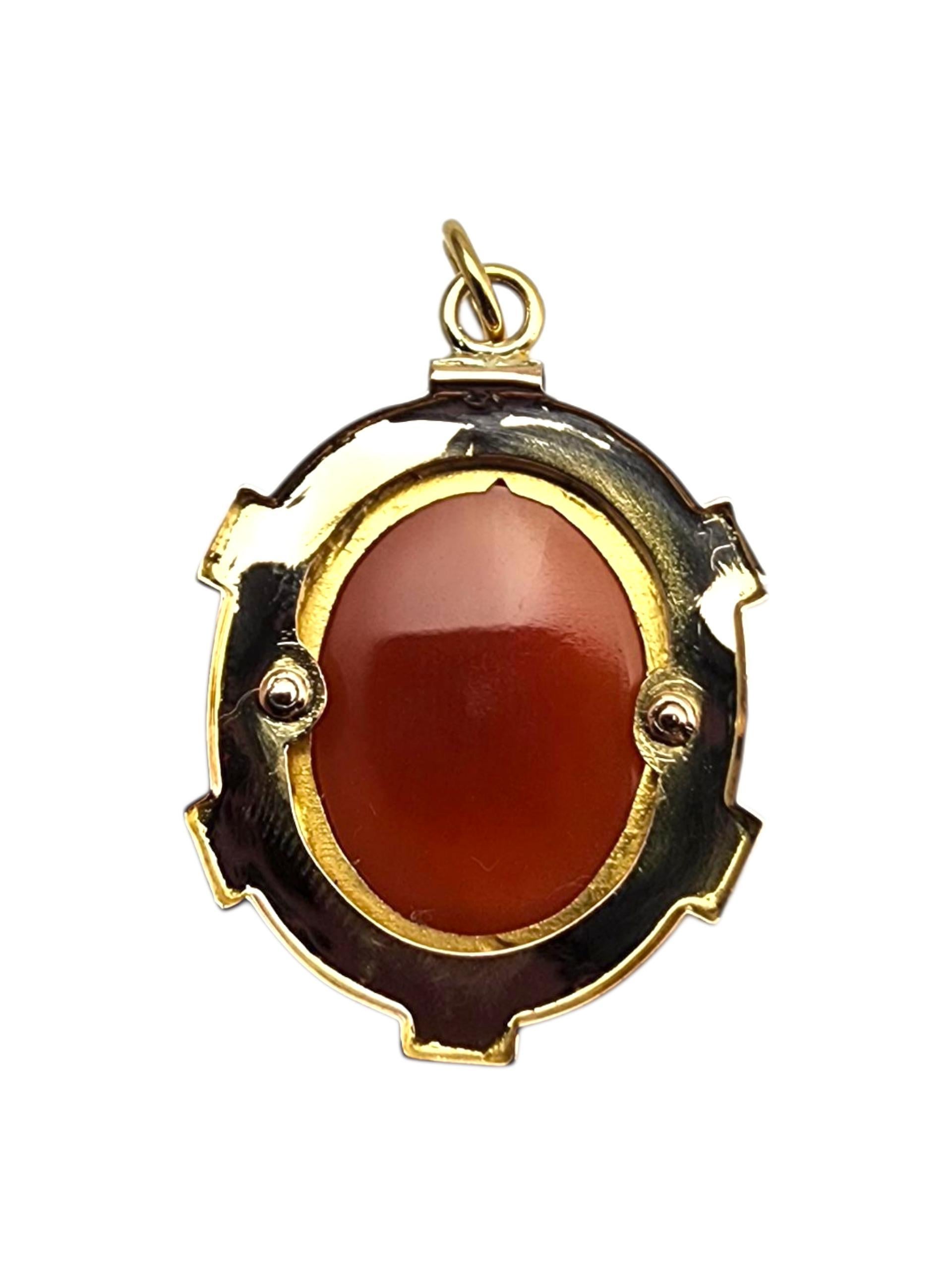 18K Yellow Gold Cameo Pendant-

This 18K yellow gold cameo pendant features a beautifully carved portrait set in a warm, rich gold frame, combining classic artistry with luxurious craftsmanship for a timeless statement piece with accent