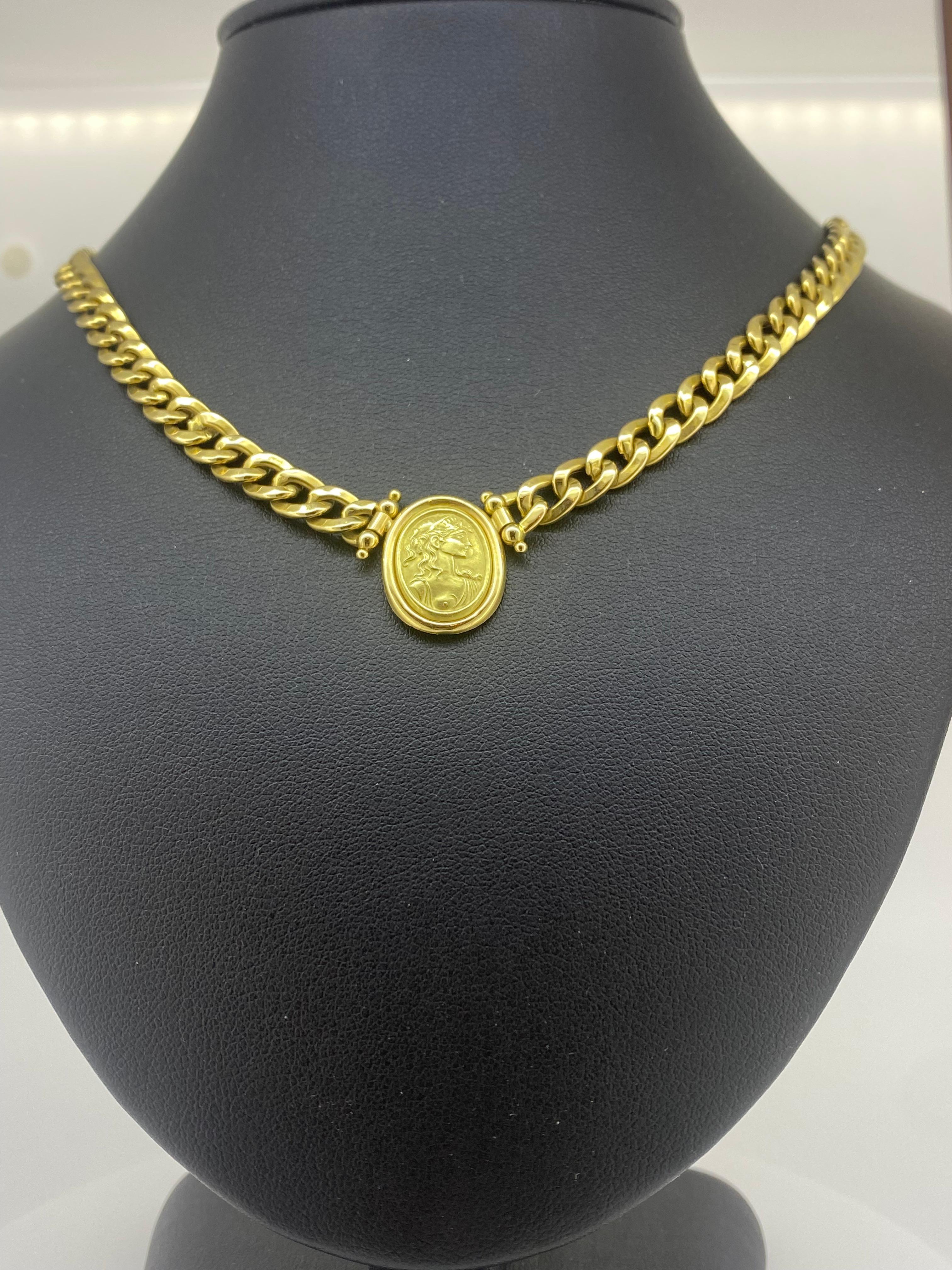 This Italian vintage necklace is a treasure to behold:

Crafted from 18K yellow gold, 
it features a stunning cameo pendant, 
that measures 18mm x 14mm &
stamped 750 to the reserve.
The framed pendant is embossed with a portrait of Roman lady,