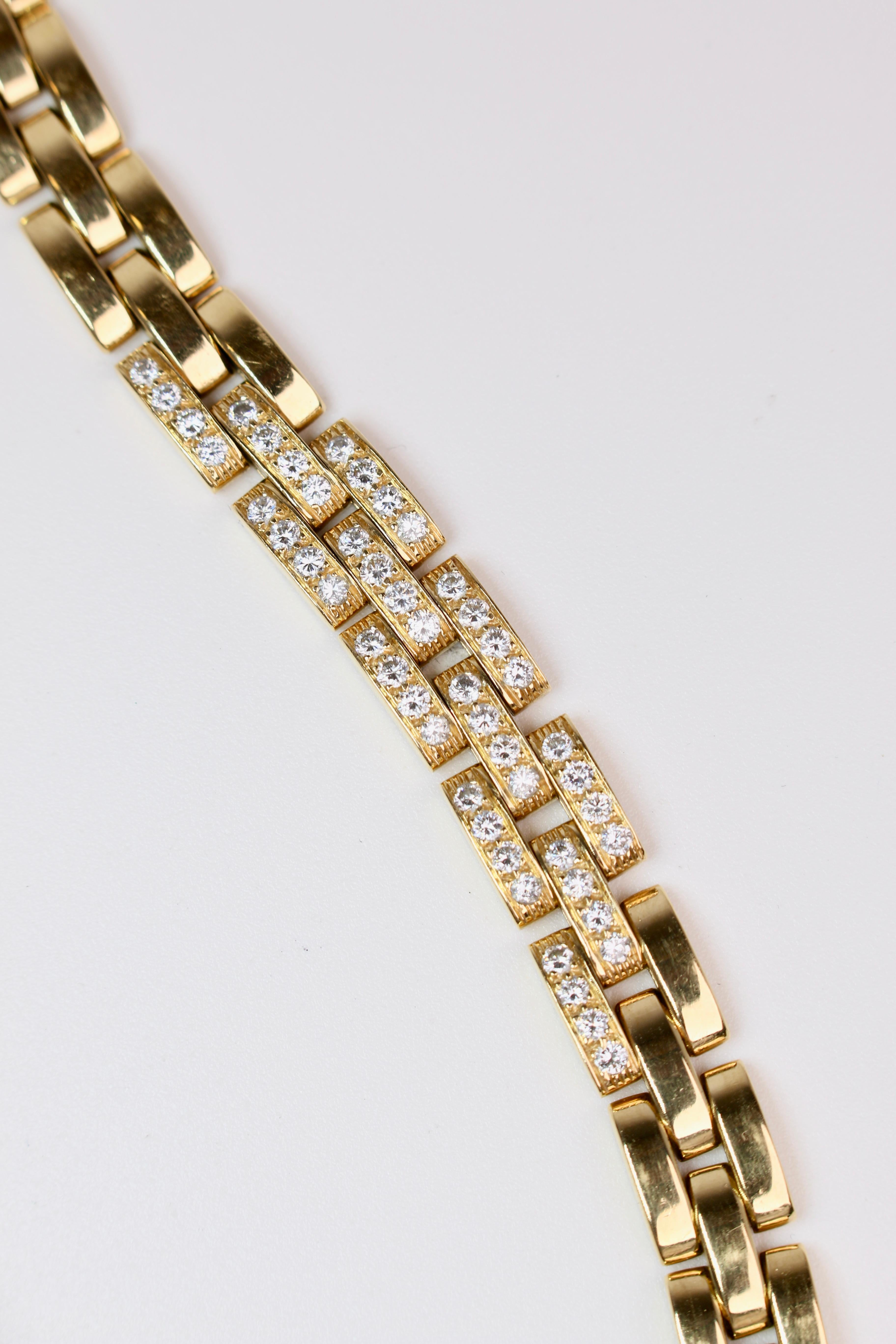 This 14k Yellow Gold Cartier Panther Link Bracelet is Stamped Cartier 750, features 48 round cut diamonds and measures 7.25 inches in length. The bracelet weighs in at 41.2 grams and is 3/8 an inch wide.