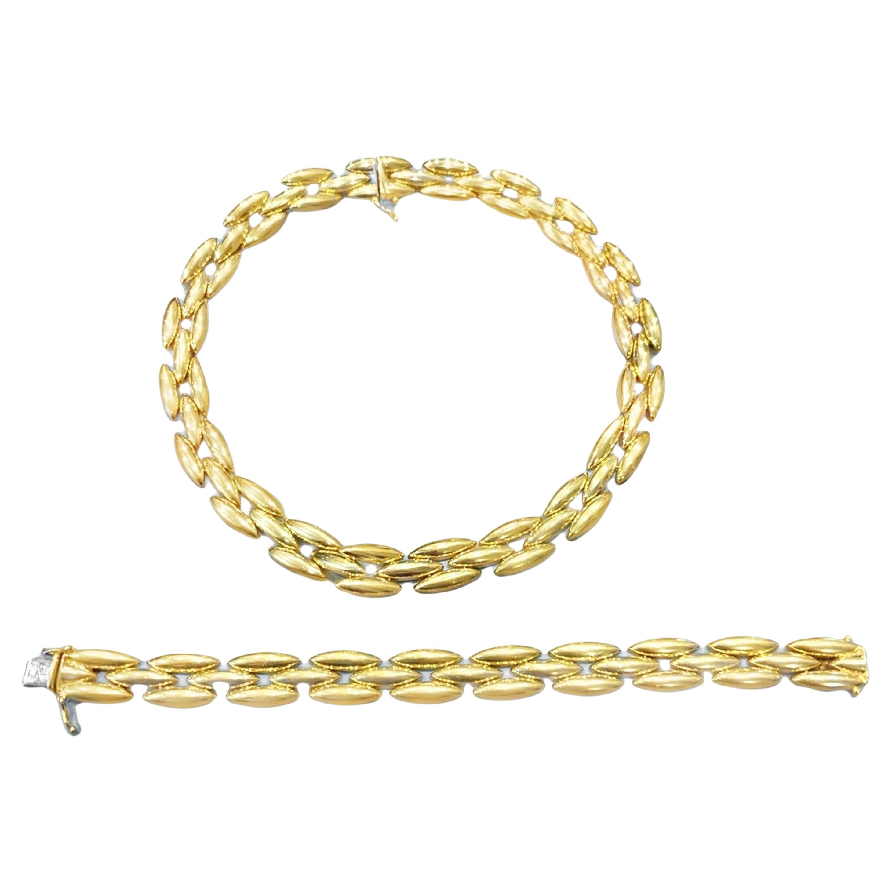 Collar y pulsera Cartier "Grain de Riz" Demi Parure de oro amarillo de 18 quilates en venta