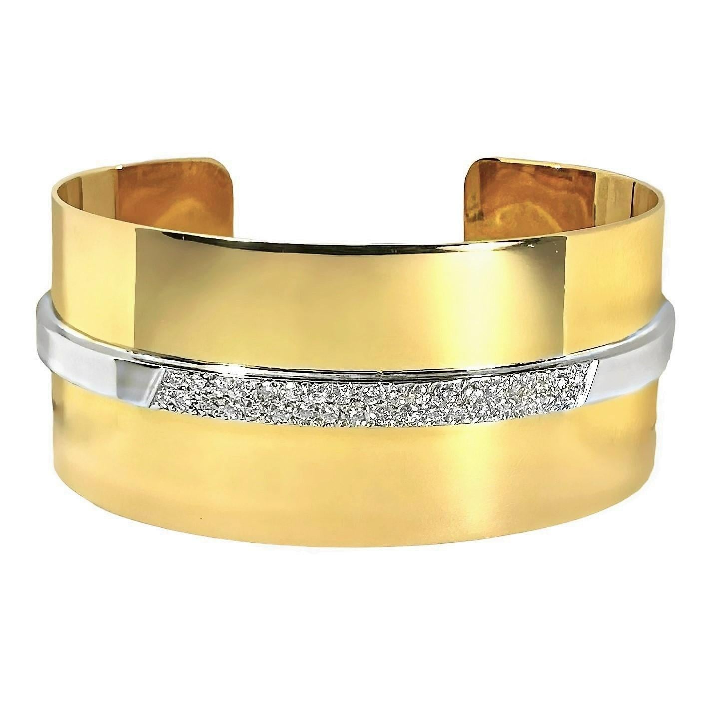 This sophisticated 18K yellow and white gold Modernist cuff bracelet is just as 