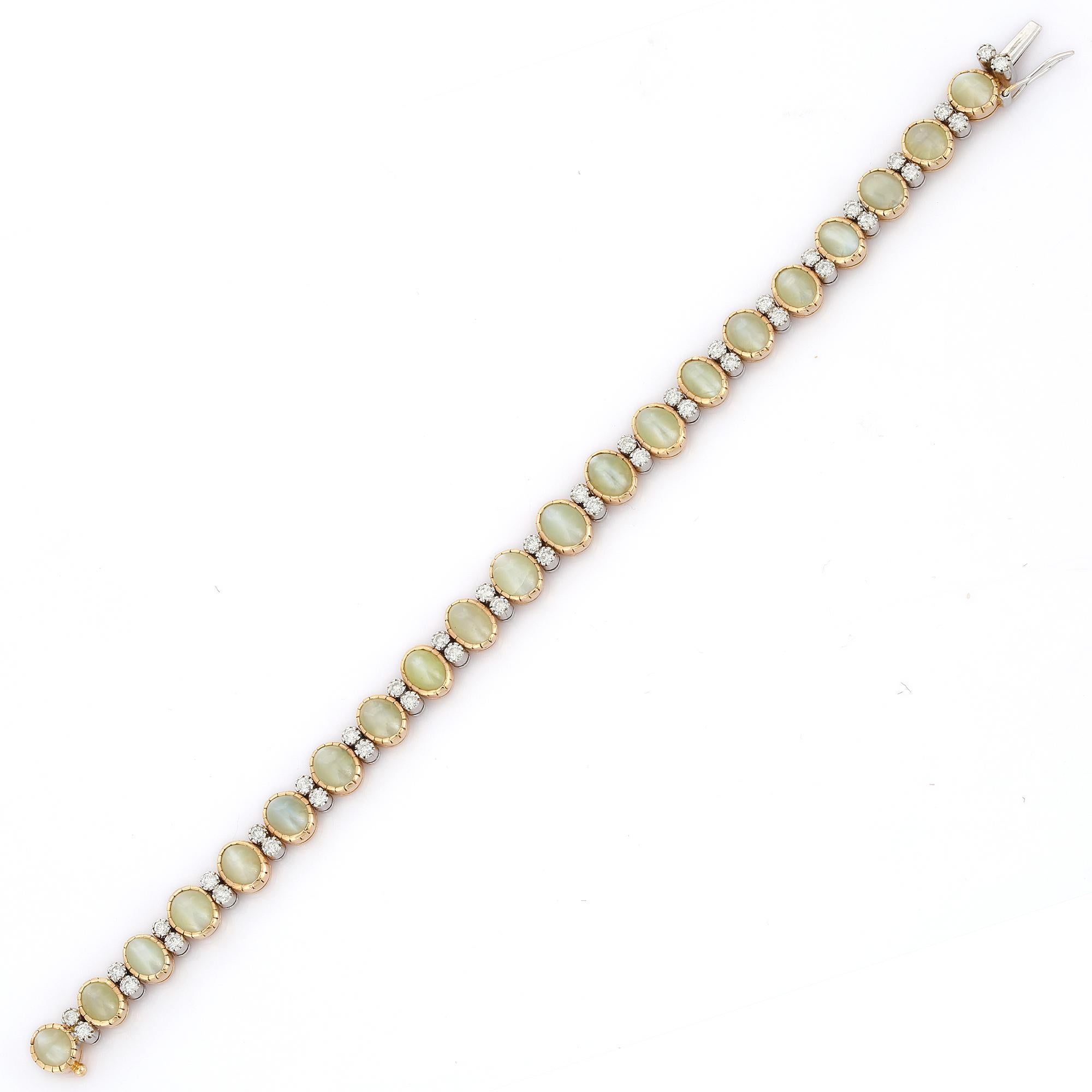 Classical Greek 18K Yellow Gold Cat's Eye Oval Cut Tennis Bracelet with Diamonds For Sale