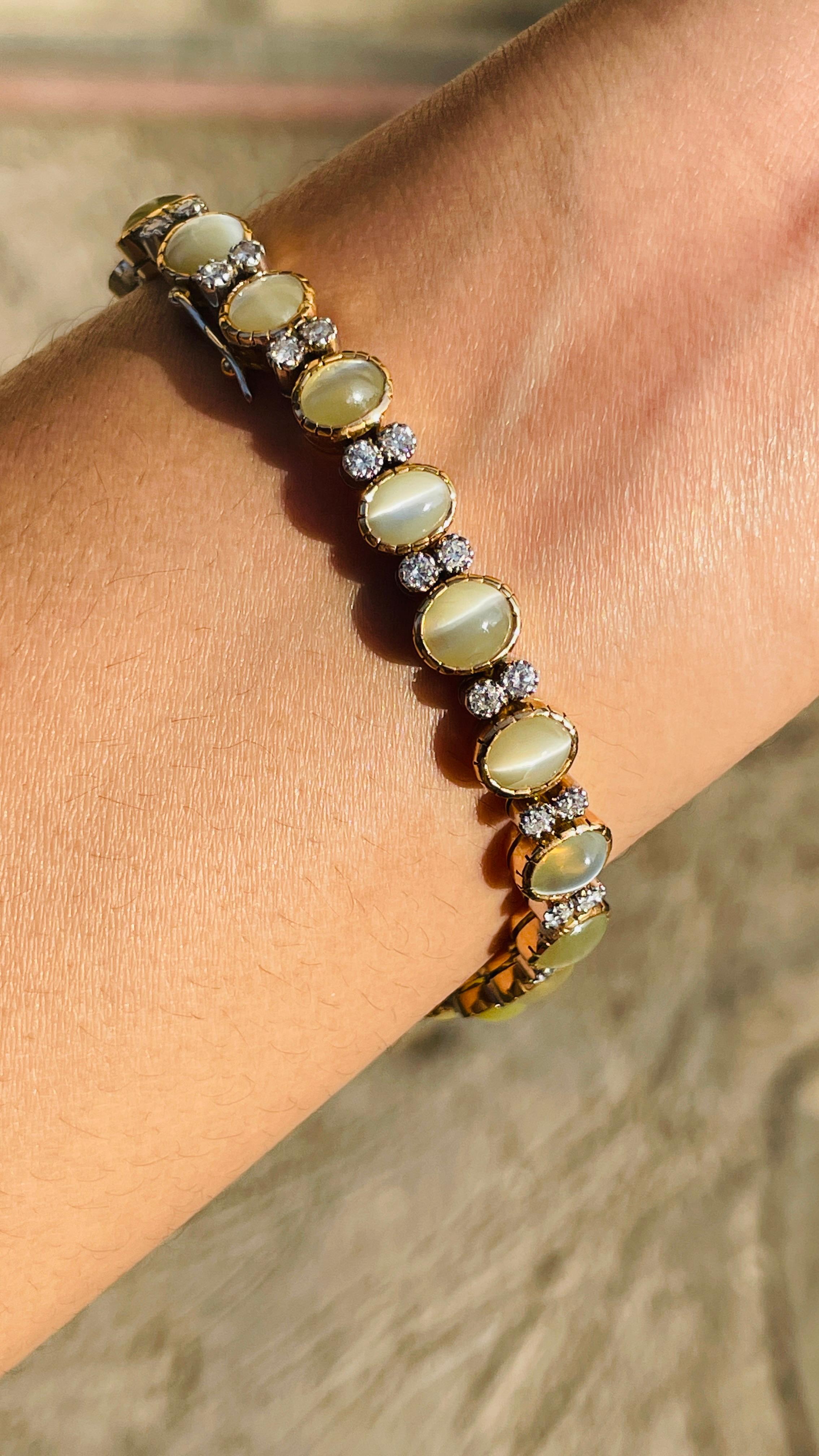 Pulsera de tenis de oro amarillo de 18 quilates con diamantes, talla oval y ojo de gato en venta 1