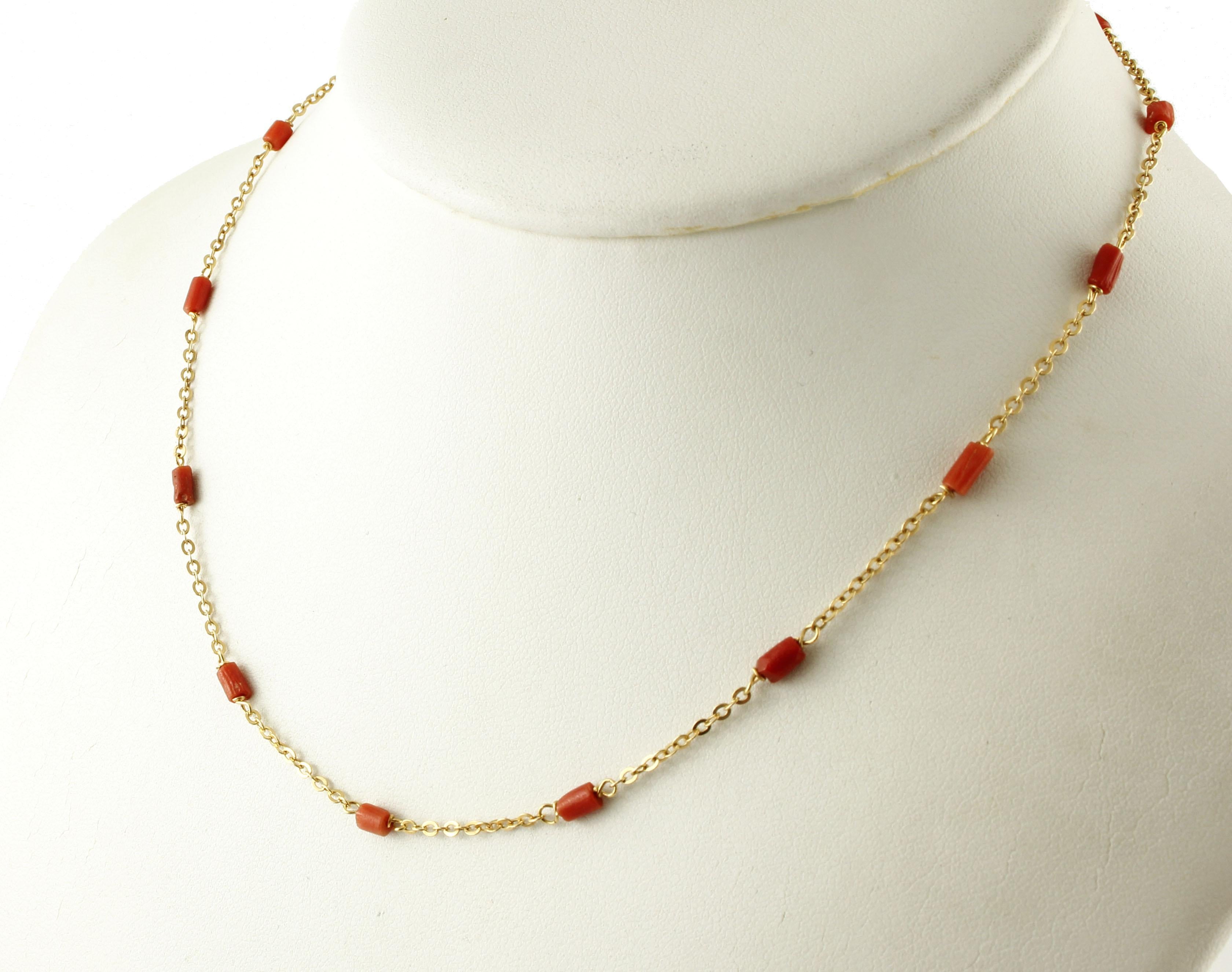 Lovely fine necklace consisting of 18k yellow gold chain and red rubrum coral decorations. 
This necklace is totally handmade by Italian master goldsmiths
Coral 1.05 g
Total weight 3.8 g
Length 38 cm
RF + IRC

For any enquires, please contact the