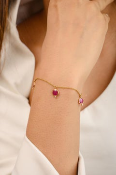 Bracciale a catena in oro giallo 18K con diamante e rubino pendente