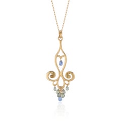 18 Karat Gold Chandelier Necklace with Blue Sapphire Teardrops and Canary Diam