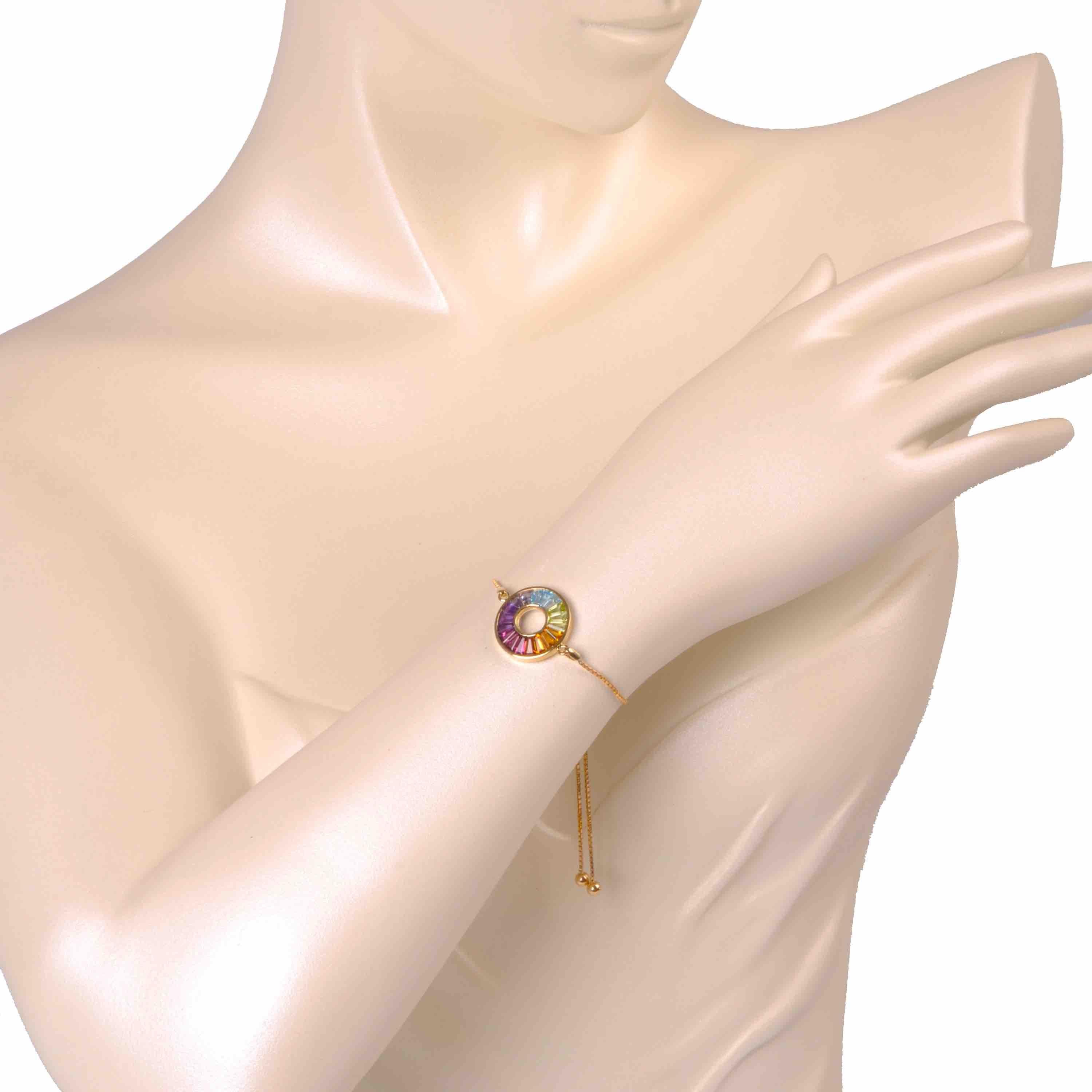 Contemporary 18K Yellow Gold Channel-Set Rainbow Taper Baguette Gemstones Bolo Bracelet For Sale