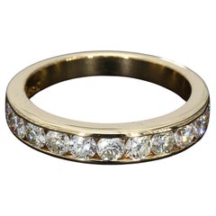 18k Yellow Gold Channel Set Ring with Eleven Round Brilliant Diamonds - Size 6.5