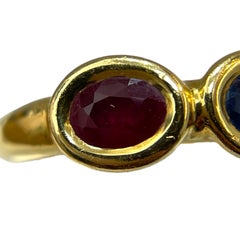 Gorgeous Timeless 18K Yellow Gold Chaumet Paris Oval Ruby and Sapphire Ring